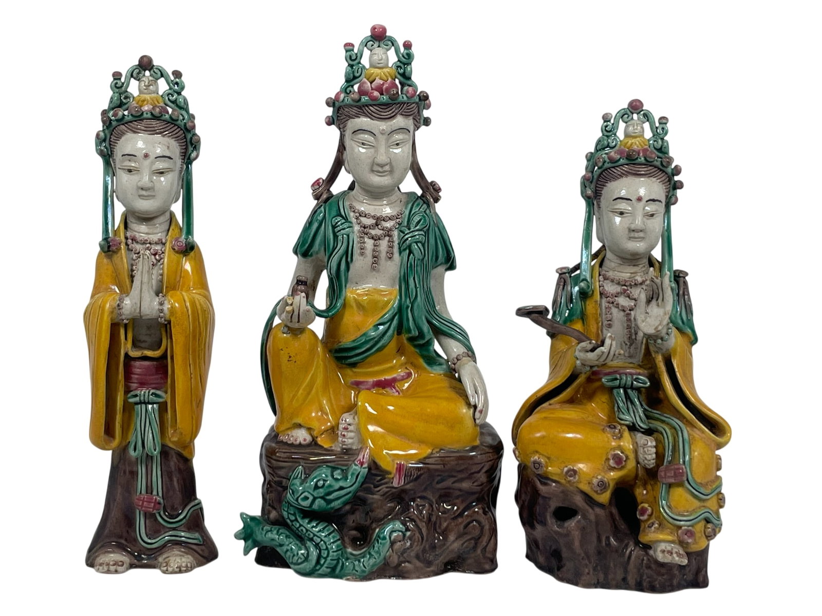 A Group of Three Chinese Sancai-Glazed Porcelain Figures: The tallest measures 9 in. high, 4.1/2 in. wide.