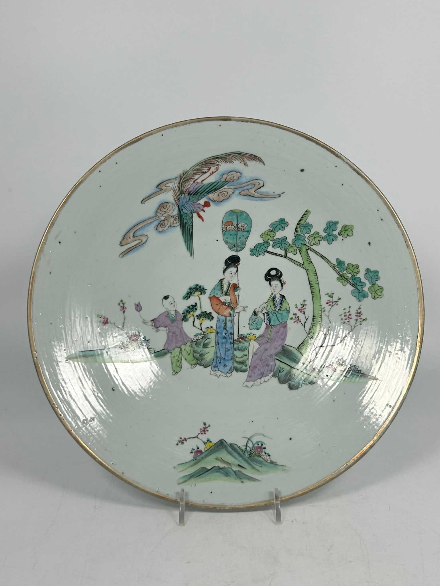 A Chinese Famille Rose 'Ladies and Boy' Porcelain Dish, Republic Period: 11.1/2 in. diam.
