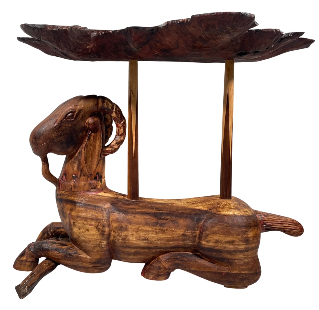 A 'Ram' Stand Side Table: 25 in. high, 31 in. wide; 21.1/2 in. deep.