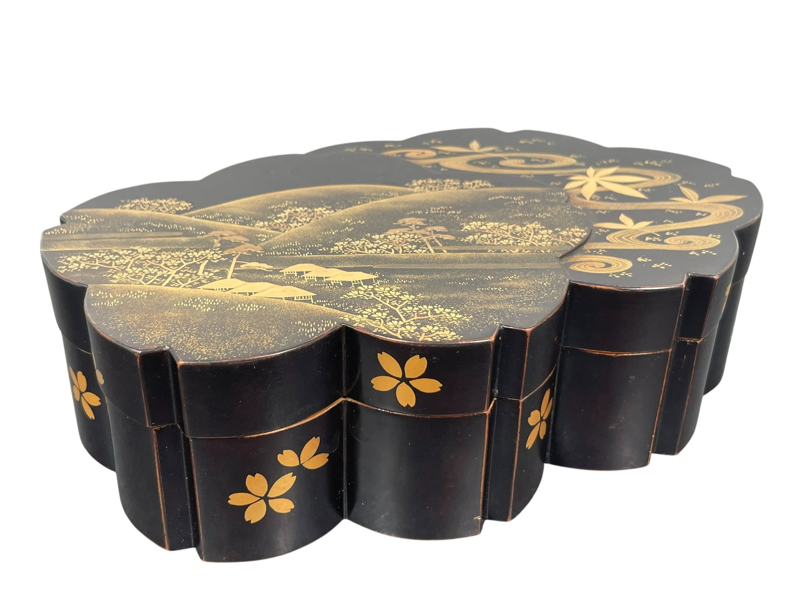A Japanese Gilt Lacquer Peach-Form Box and Cover: 2 in. high, 6.3/4 in. wide, 4 in. deep.