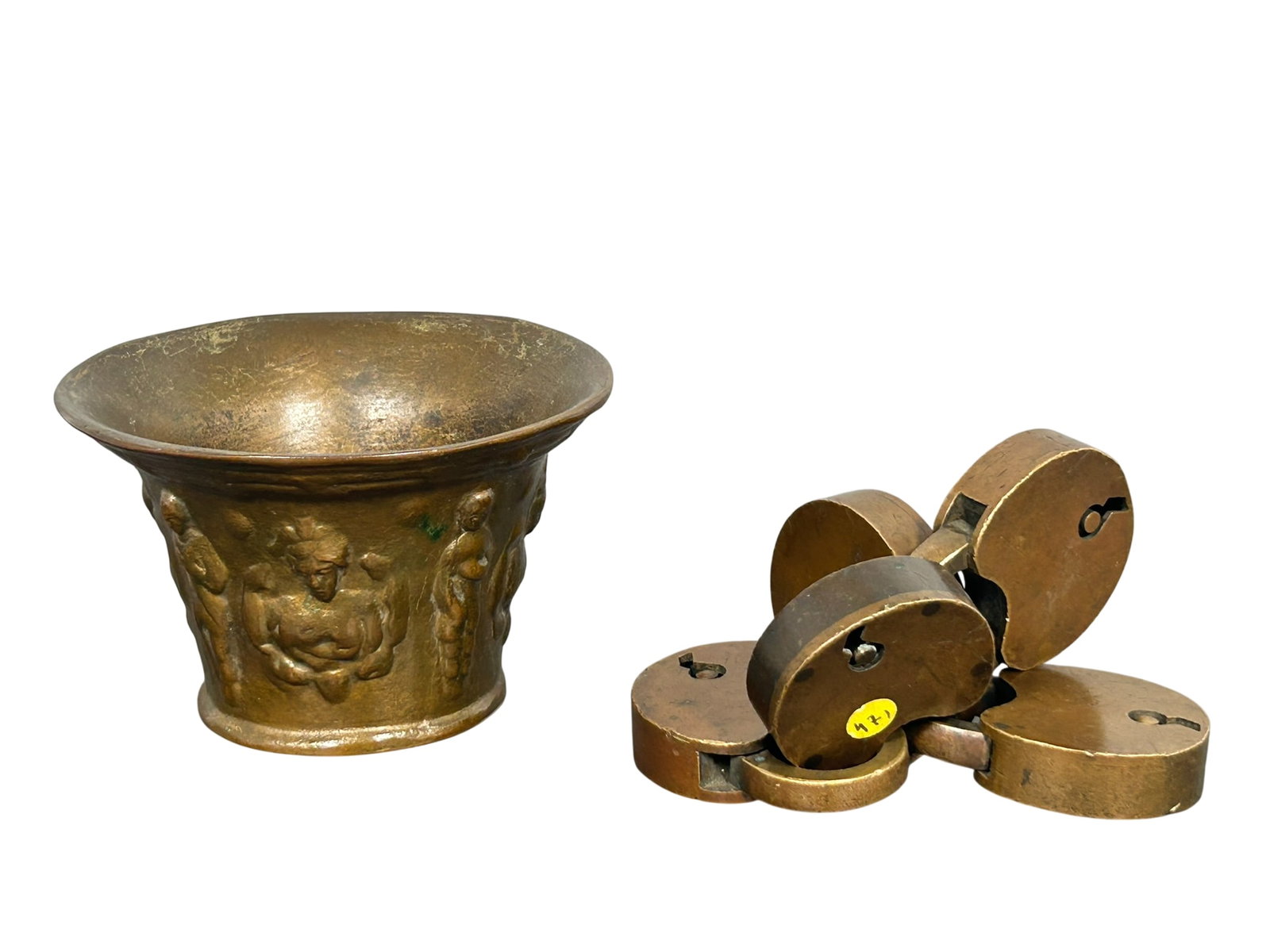 An Early Bronze Mortar and Five Bronze Locks: The bronze mortar measures 2.3/4 in. high, 4.1/4 in. wide; the locks measures 2.1/4 in. long, 1.3/4 in. wide each.