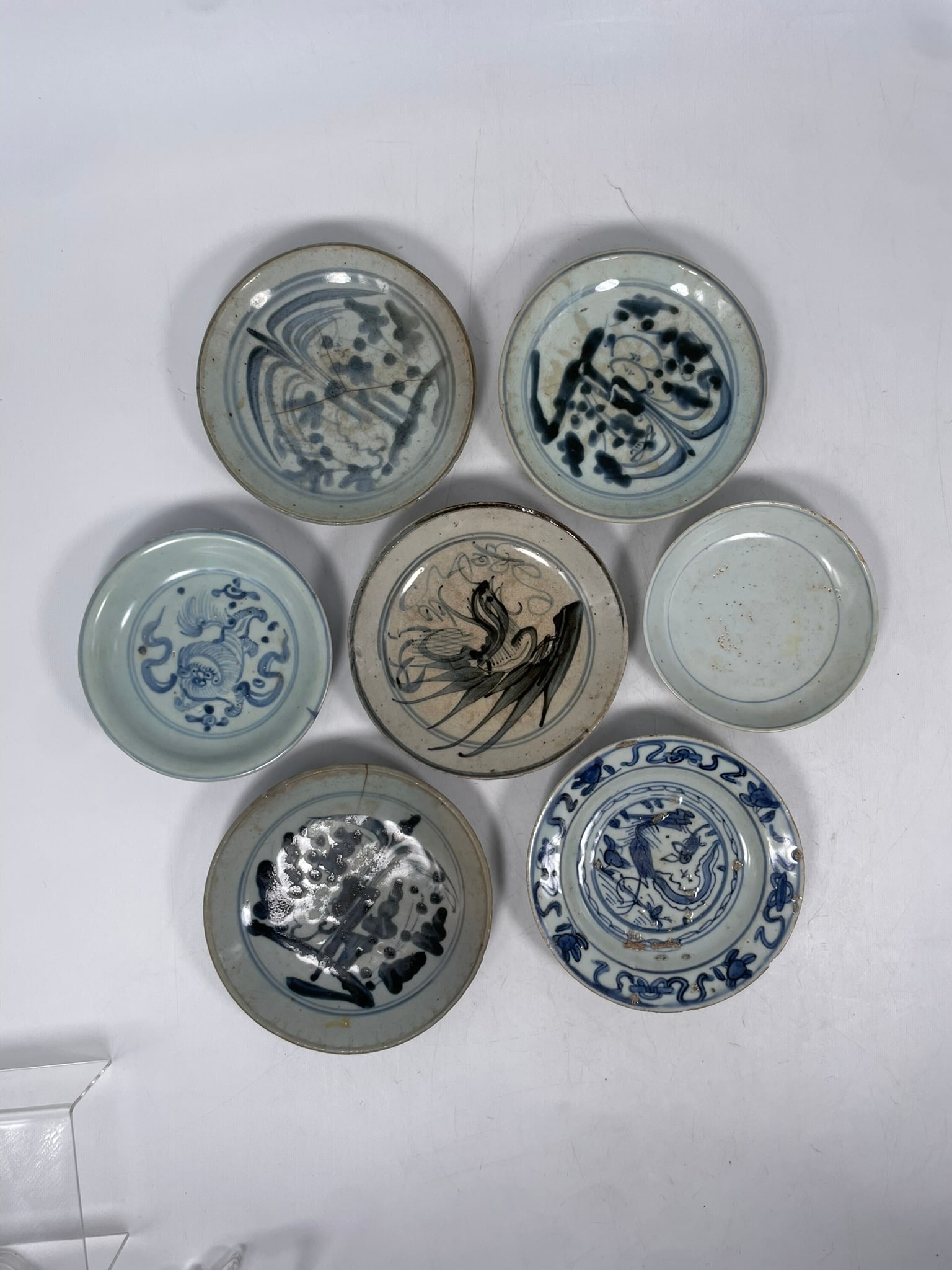 A Group of Seven Chinese Small Blue and White Dishes, Ming Dynasty: The largest measures 6.1/4 in. diam. Provenance: From the renowned John Allen Tabor Collection. John Tabor (1917?1991), a U.S. Foreign Service officer with USAID, worked throughout Asia in the 1960s a