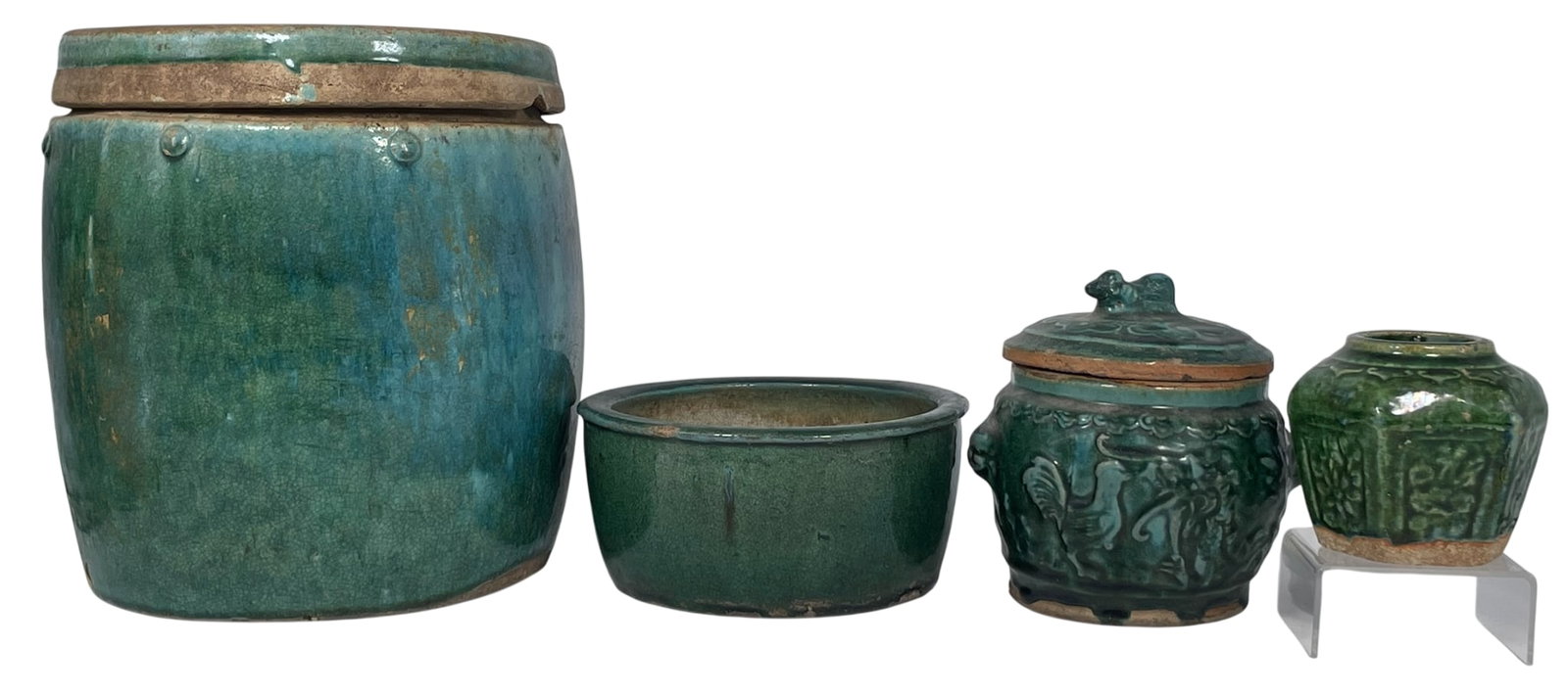 A Group of Four Green-Glazed Porcelain Ware: The largest jar and cover measures 10 in. high, 9 in. wide. A Private Collection of a Retiring University Professor.