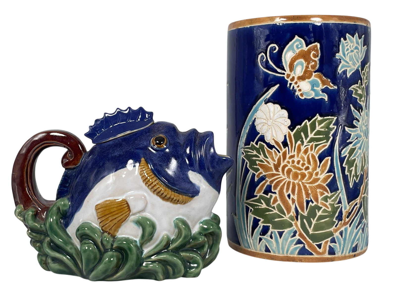 Two Glazed Porcelain Ware: The pot measures 11 in. high, 6.3/4 in. diam; the fish-shaped pot measures 7 in. high, 9.1/2 in. wide. A Private Collection of a Retiring University Professor.