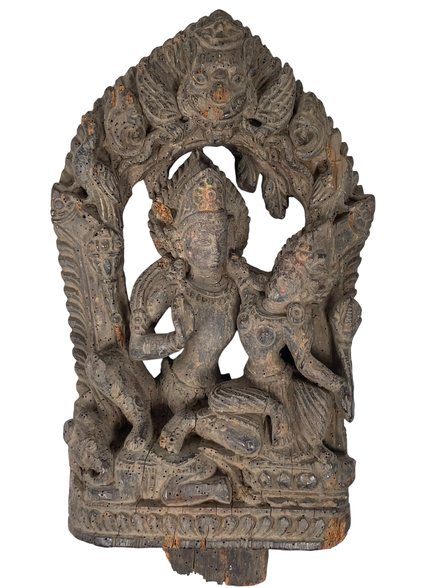 A Nepalese Carved Wood Figural Group of Lord Shiva and Goddess Parvati: In Hindu tradition, Lord Shiva and Goddess Parvati represent the ultimate divine couple, embodying the cosmic balance of the universe. 15 in. high, 8.1/2 in. wide.