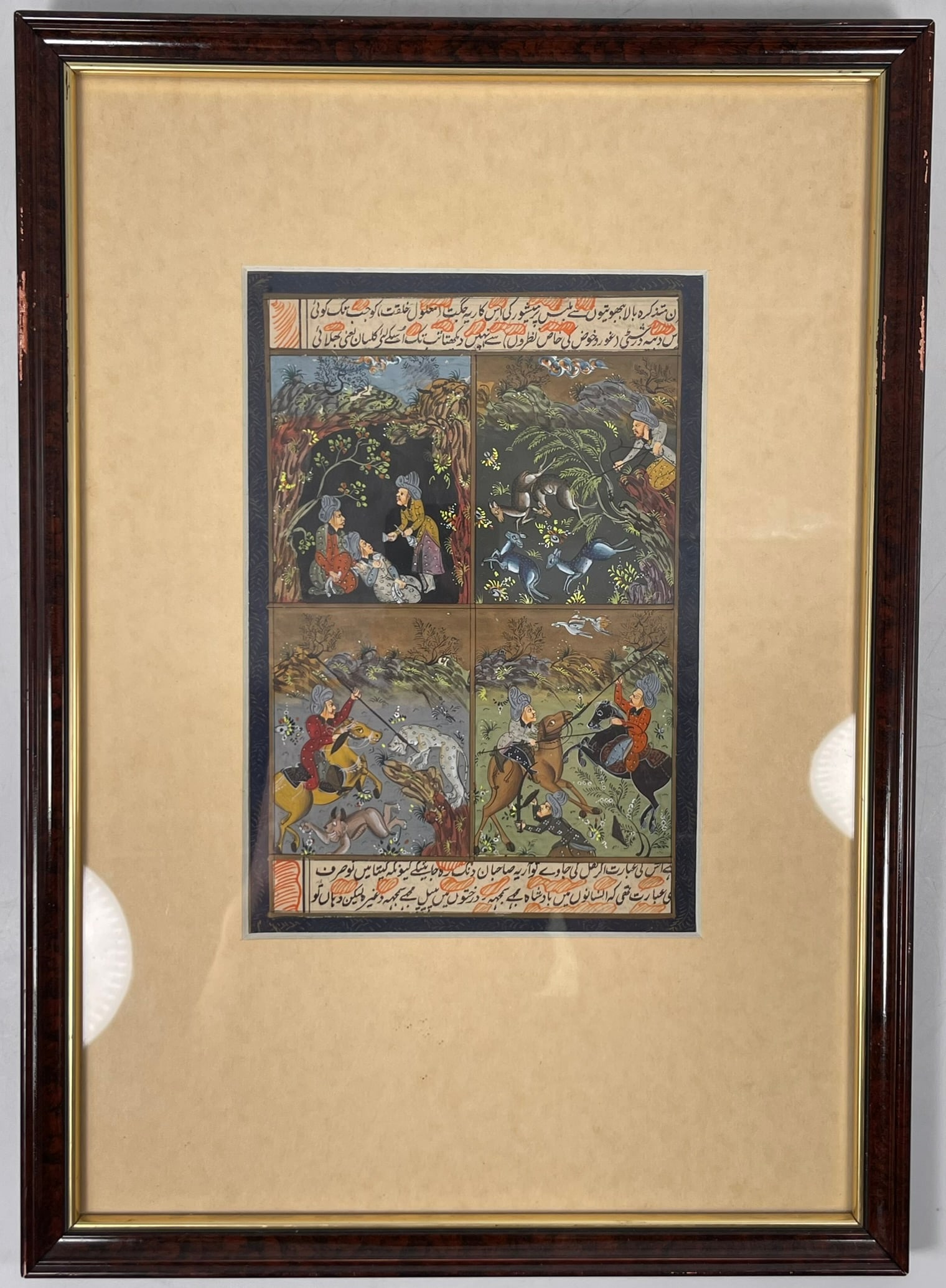A Mughal-Style Miniature Painting of Hunting Scenes: 15 in. x 10.3/4 in. overall including the frame.