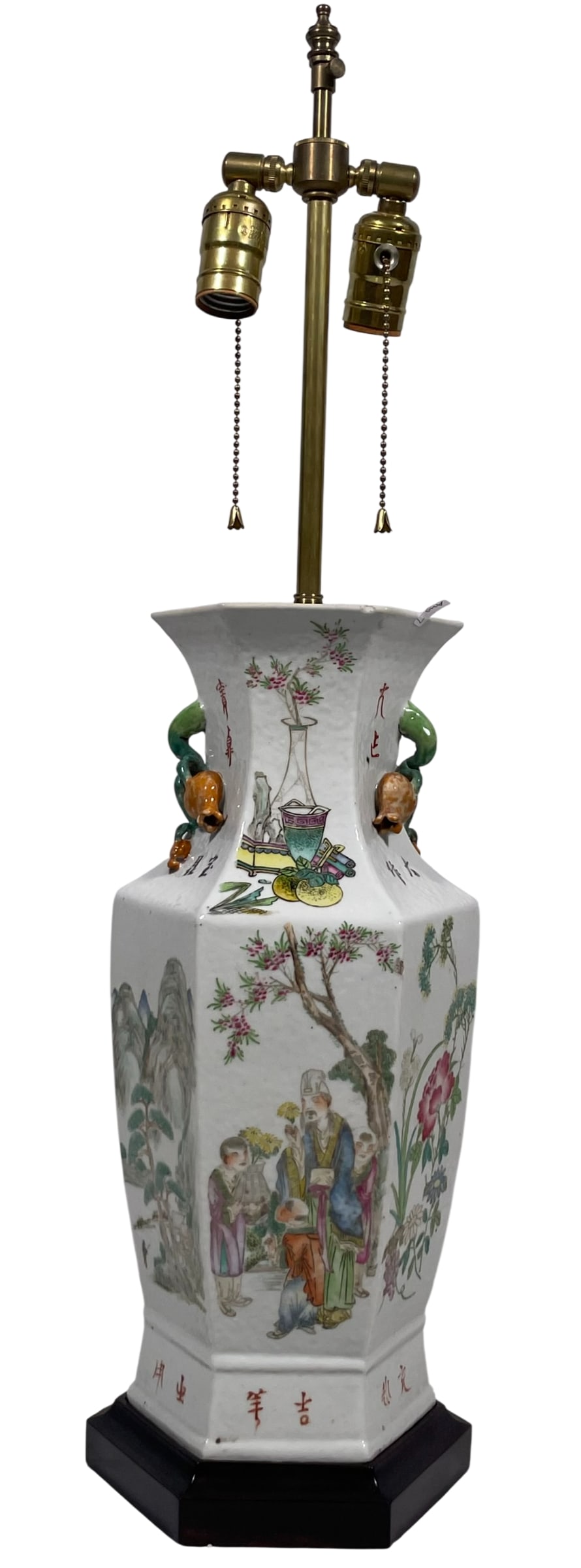 A Chinese Qianjiang-Enameled Hexagonal 'Figural' Porcelain Vase, Republic Period: 16 in. high, 7.1/2 in. wide for the vase, 29 in. high, 7.1/2 in. wide.