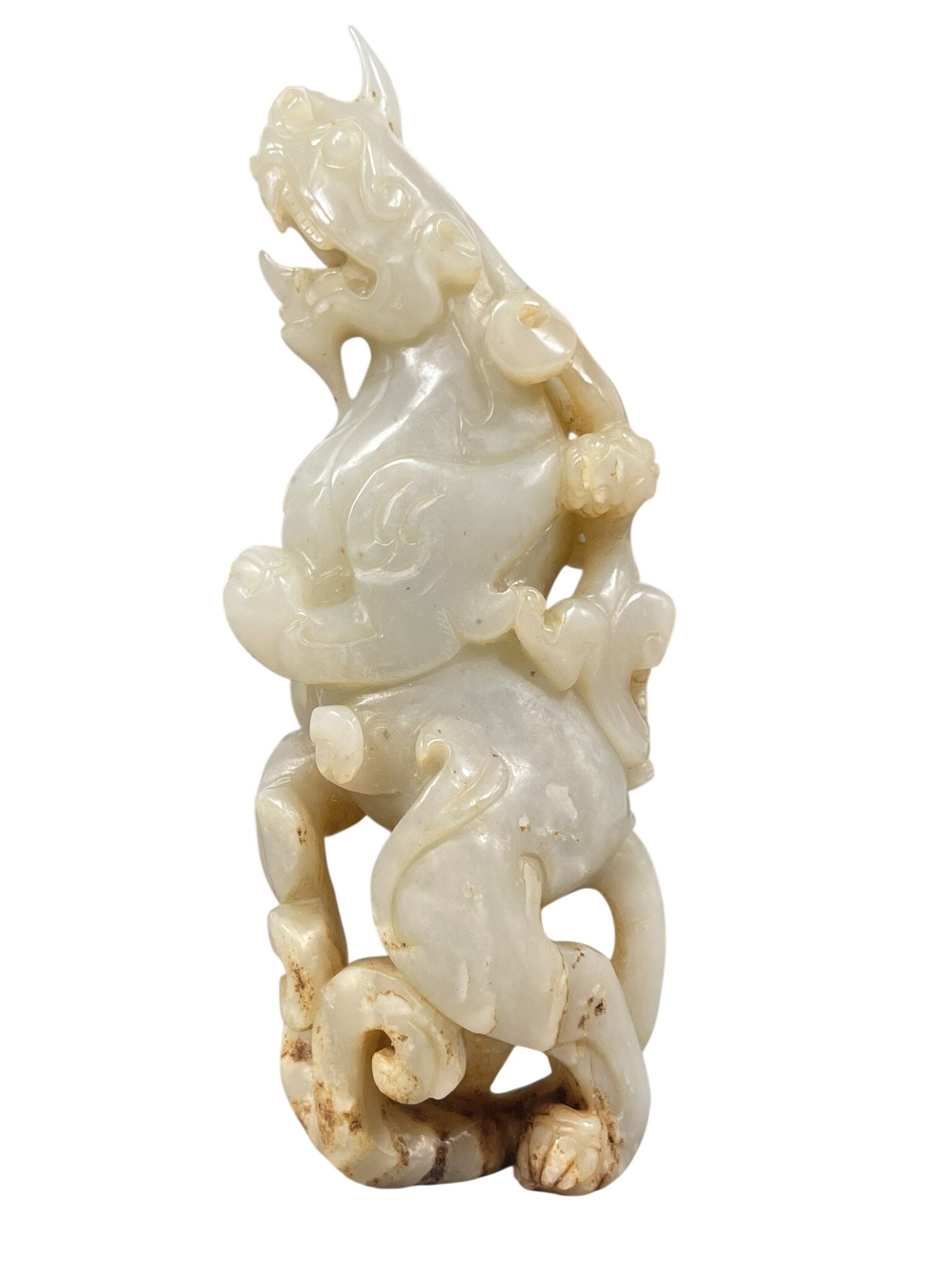 A Chinese White and Russet Jade Carving of Chilong (1 of 13)
