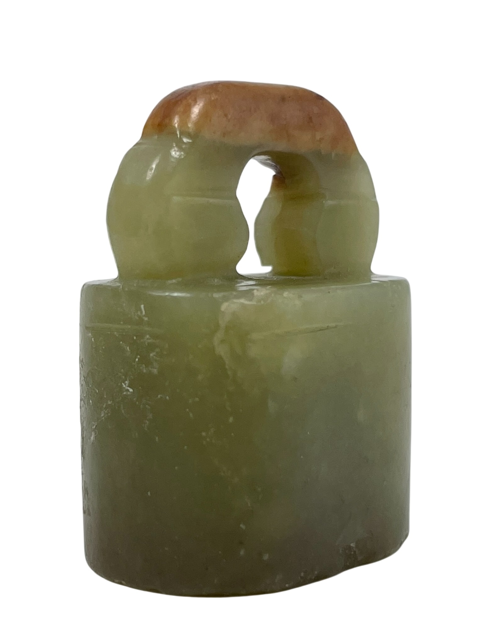 A Chinese Carved Jade Seal: 1.1/2 in. high, 1.1/8 in. wide.