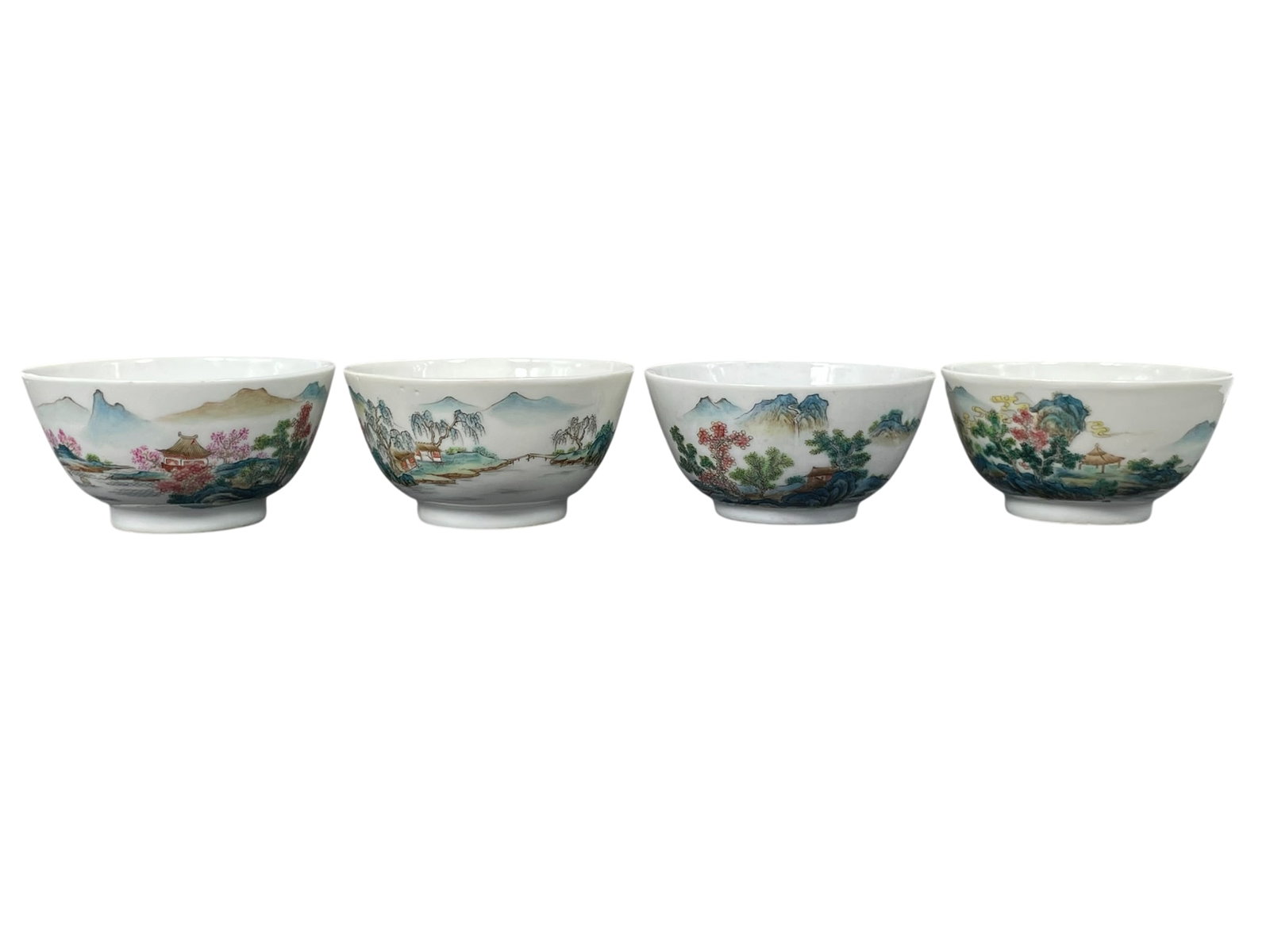 A Set of Chinese Famille Rose Porcelain Tea Cups, Republic Period: All with apocryphal Jiaqing marks to the undersides, 1.3/4 in. high, 3.1/2 in. diam. each.