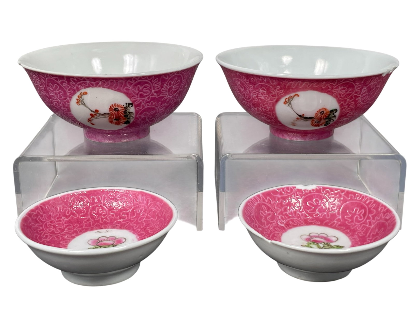 A Group of Four Chinese Small Famille Rose Pink-Ground Sgraffito 'Medallion' Vessels: The pair of bowls measures 1.5/8 in. high, 3.5/8 in. diam. each; the pair of saucers measures 2.3/4 in. diam. each.