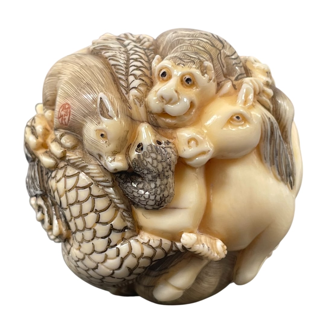 A Japanese Carved Bone Okimono (1 of 11)