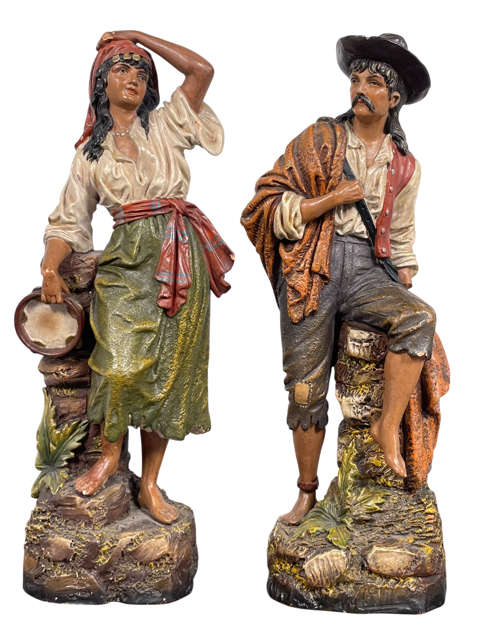 Two Antique Painted Pottery Figures of Roma: 8.1/4 in. high, 3.1/4 in. wide each.