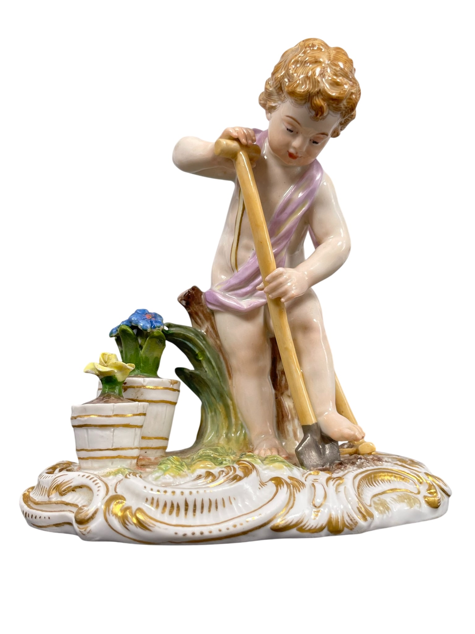 A Meissen Figurine of Putti Working in the Garden: 4.1/2 in. high, 4.3/8 in. wide.