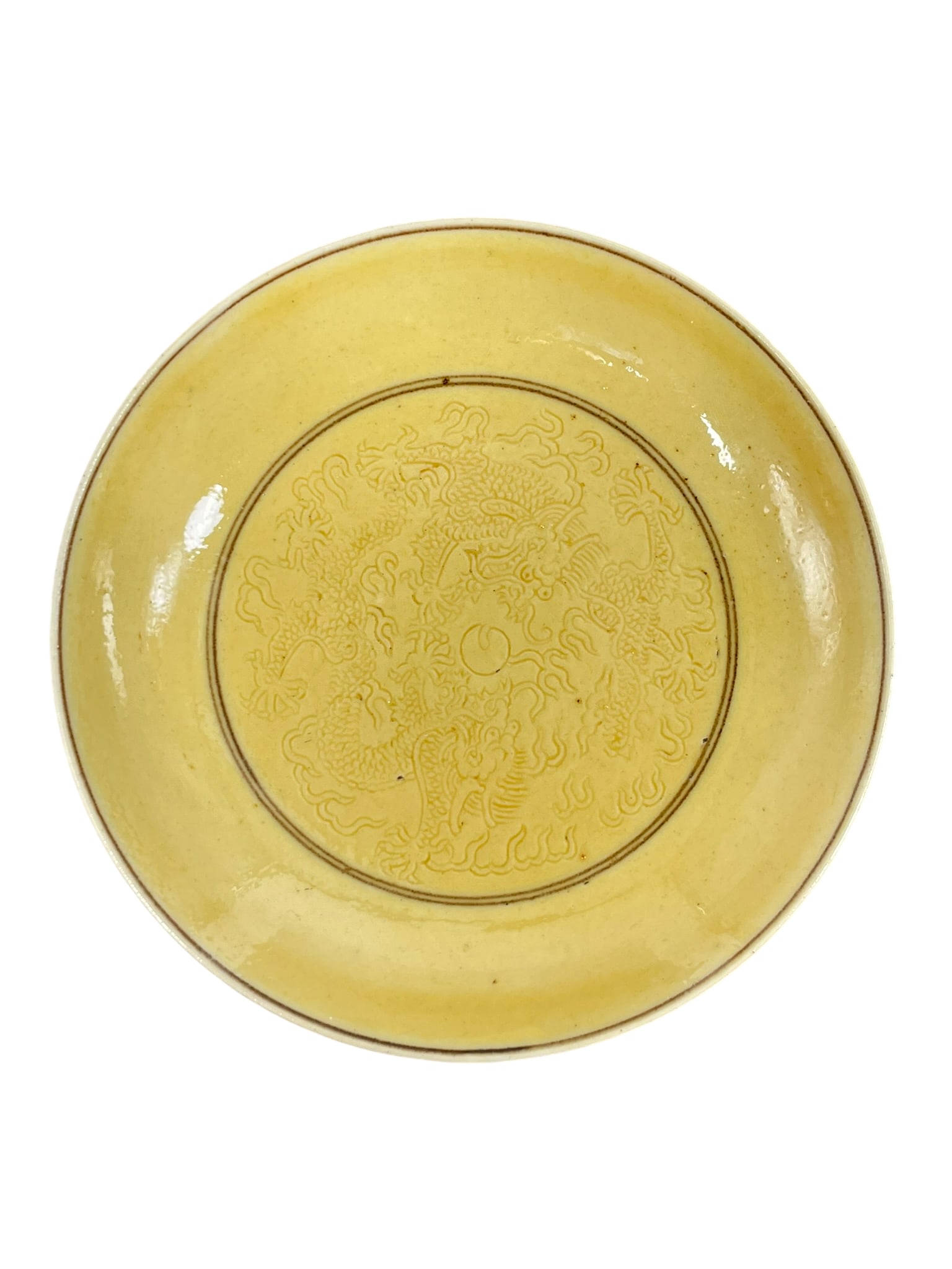 A Chinese Small Yellow-Glazed Incised 'Dragon' Porcelain Dish, Tongzhi Mark: 4.1/2 in. diam.