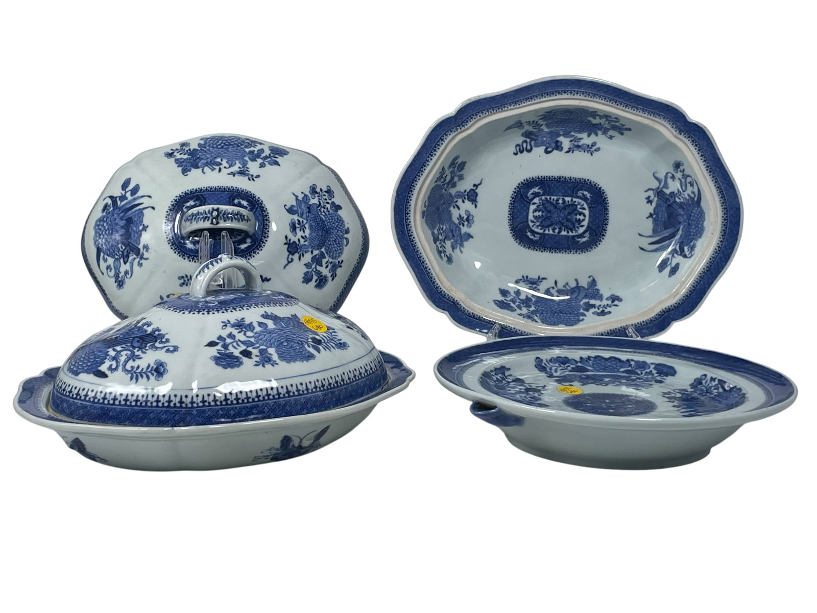 A Group of Three Chinese Blue and White Porcelain Vessels: Comprising a pair of serving dishes and covers, 5 in. high, 11.1/2 in. wide each; and a warming dish, 2 in. high, 11.1/2 in. wide.