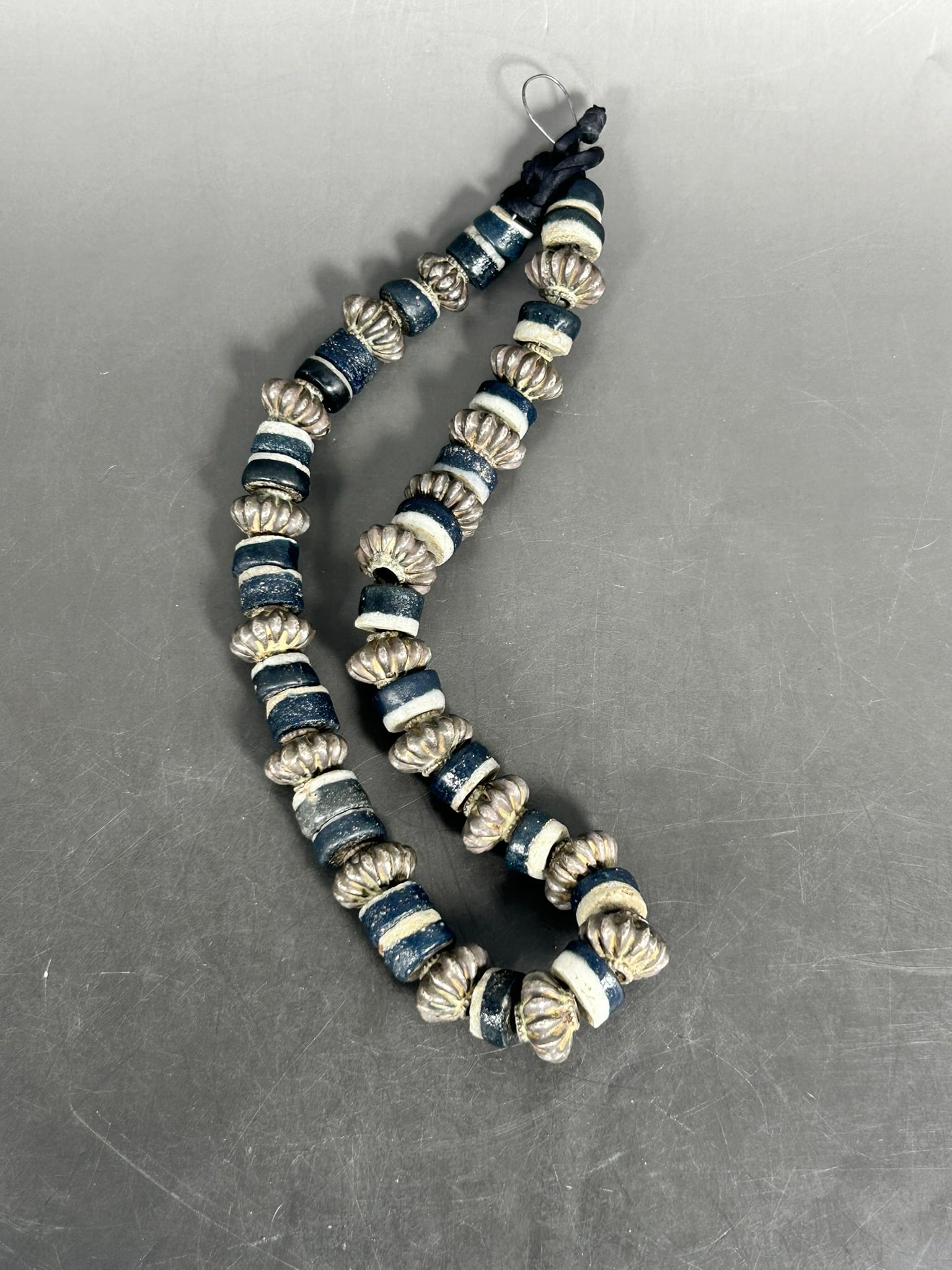 A Silver and Stone-Beaded Necklace: 22 in. long overall.