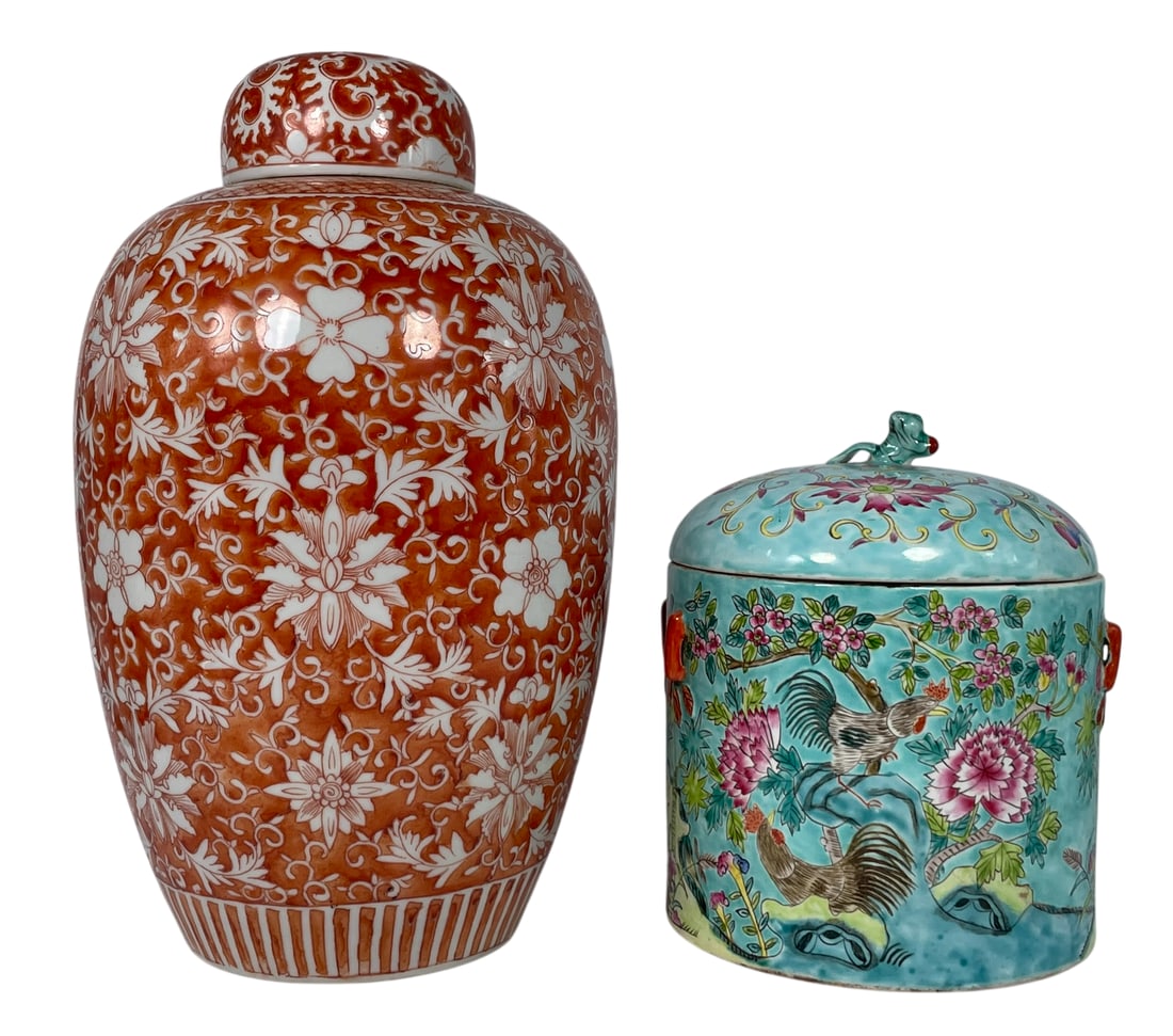 Two Chinese Porcelain Jars: Comprising an iron-red decorated jar and cover, 14.3/4 in. high, 8.3/4 in. wide; and a famille rose jar and cover, 9 in. high, 7.3/4 in. wide.