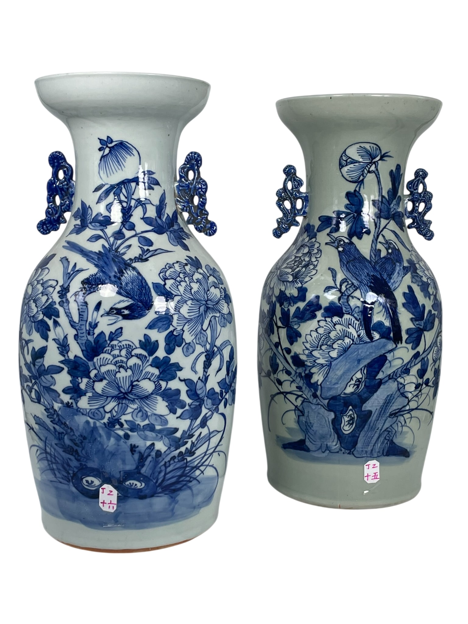 A Pair of Chinese Celadon-Glazed 'Bird and Flower' Vases: 17.1/4 in. high, 7.1/2 in. wide each.