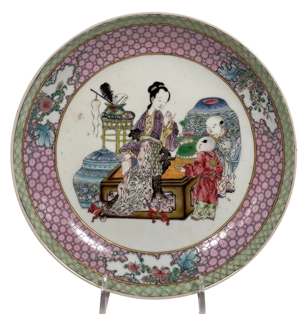 Suchow & Seigel Sticker: A Chinese Famille Rose Ruby-Back 'Lady and Boys' Porcelain Dish, 19th: A 'Suchow & Seigel' sticker to the back. 7.3/4 in. diam.