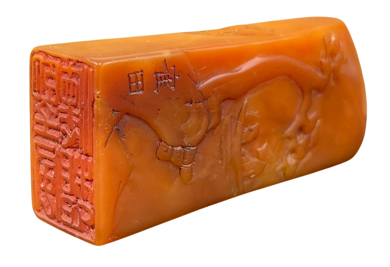 A Chinese Carved Shoushan Soapstone Seal: With a Japanese wood box. 2.1/8 in. high, 3/4 in. wide. The box measures 2.3/8 in. high, 4.1/2 in. wide, 3 in. deep.