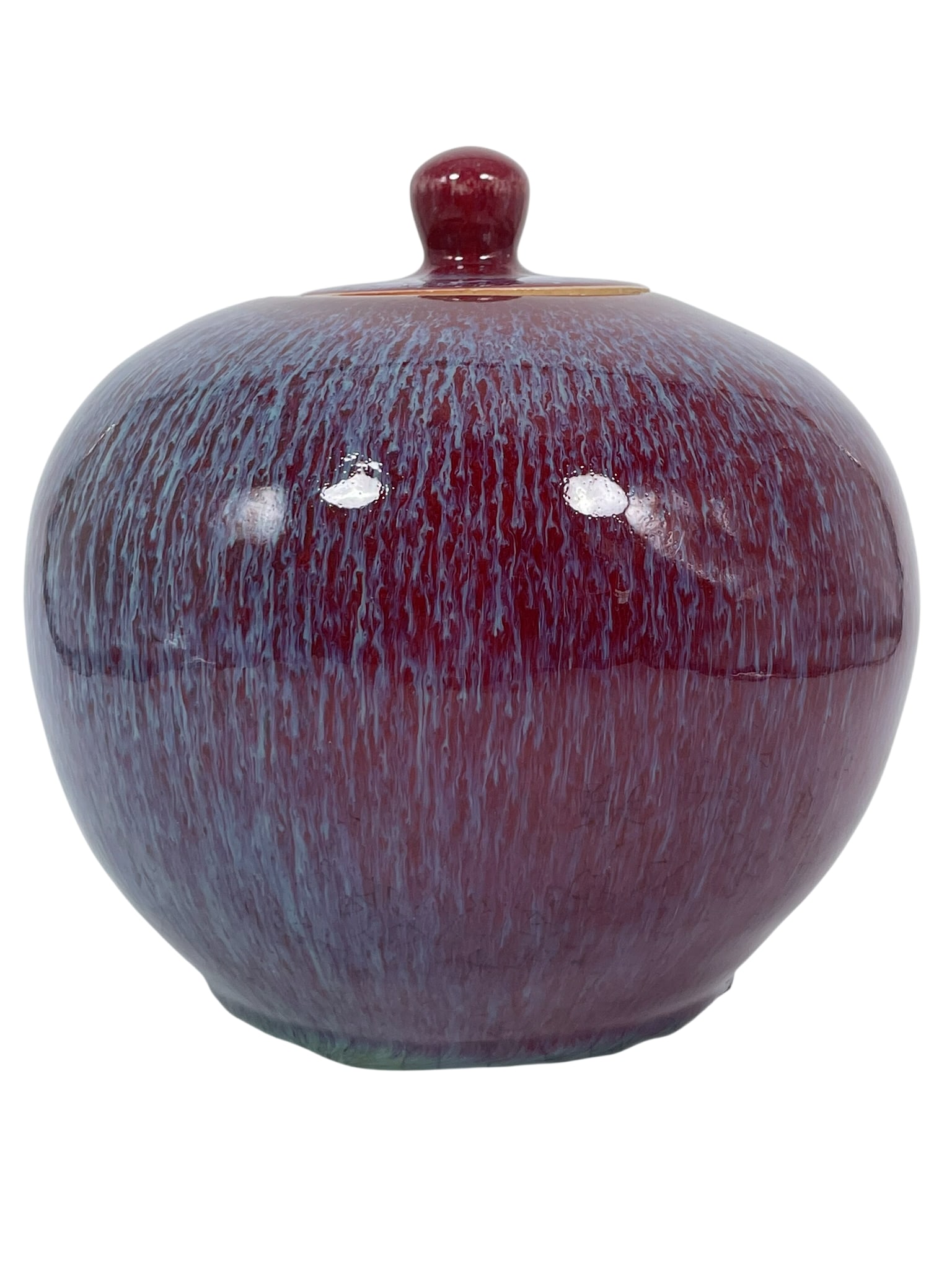 A Chinese Flambe-Glazed Porcelain Jar and Cover: 8 in. high, 8 in. wide. Property of a Private Maryland Collector.