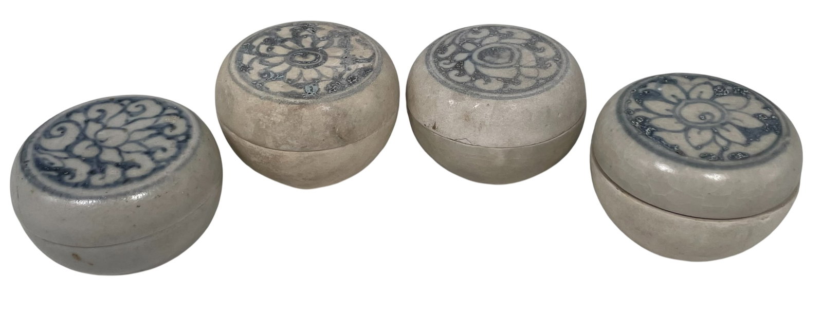 A Group of Four Blue and White Porcelain Circular Boxes and Covers: 1.3/4 in. high, 2.3/8 in. diam. for the largest one. A Private Collection of a Retiring University Professor.