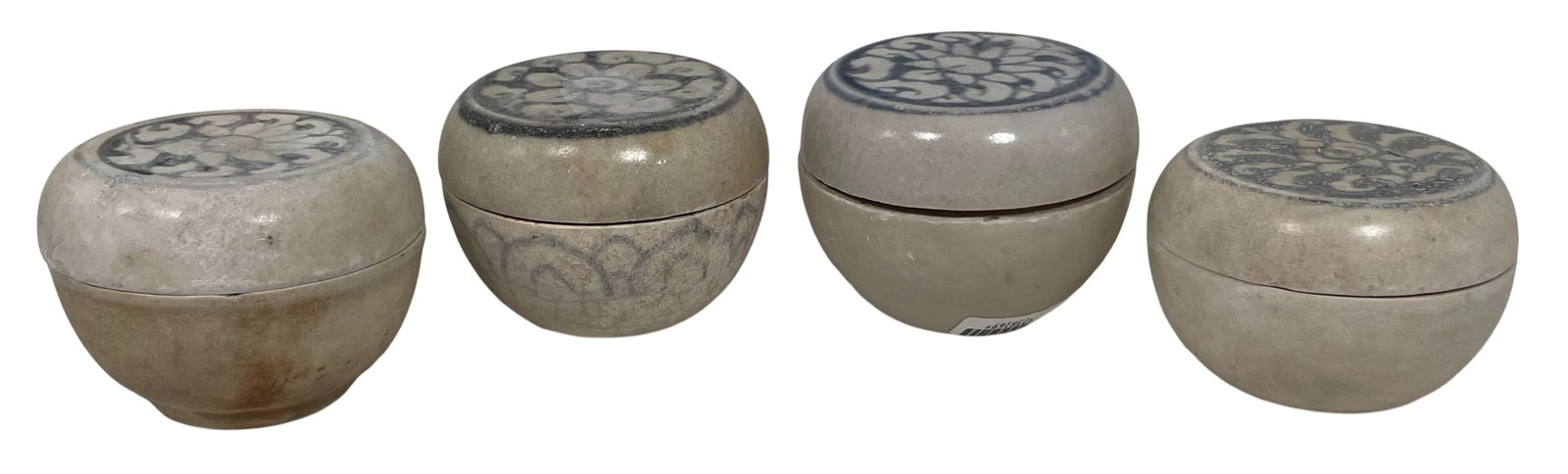 A Group of Four Blue and White Porcelain Circular Boxes and Covers: 1.7/8 in. high, 2.1/2 in. diam. for the tallest one. A Private Collection of a Retiring University Professor.