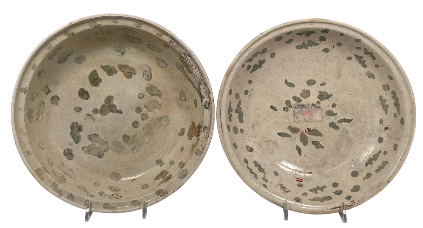 Two Painted Dishes: 2.1/4 in. high, 9.1/2 in. diam. for the larger one. A Private Collection of a Retiring University Professor.
