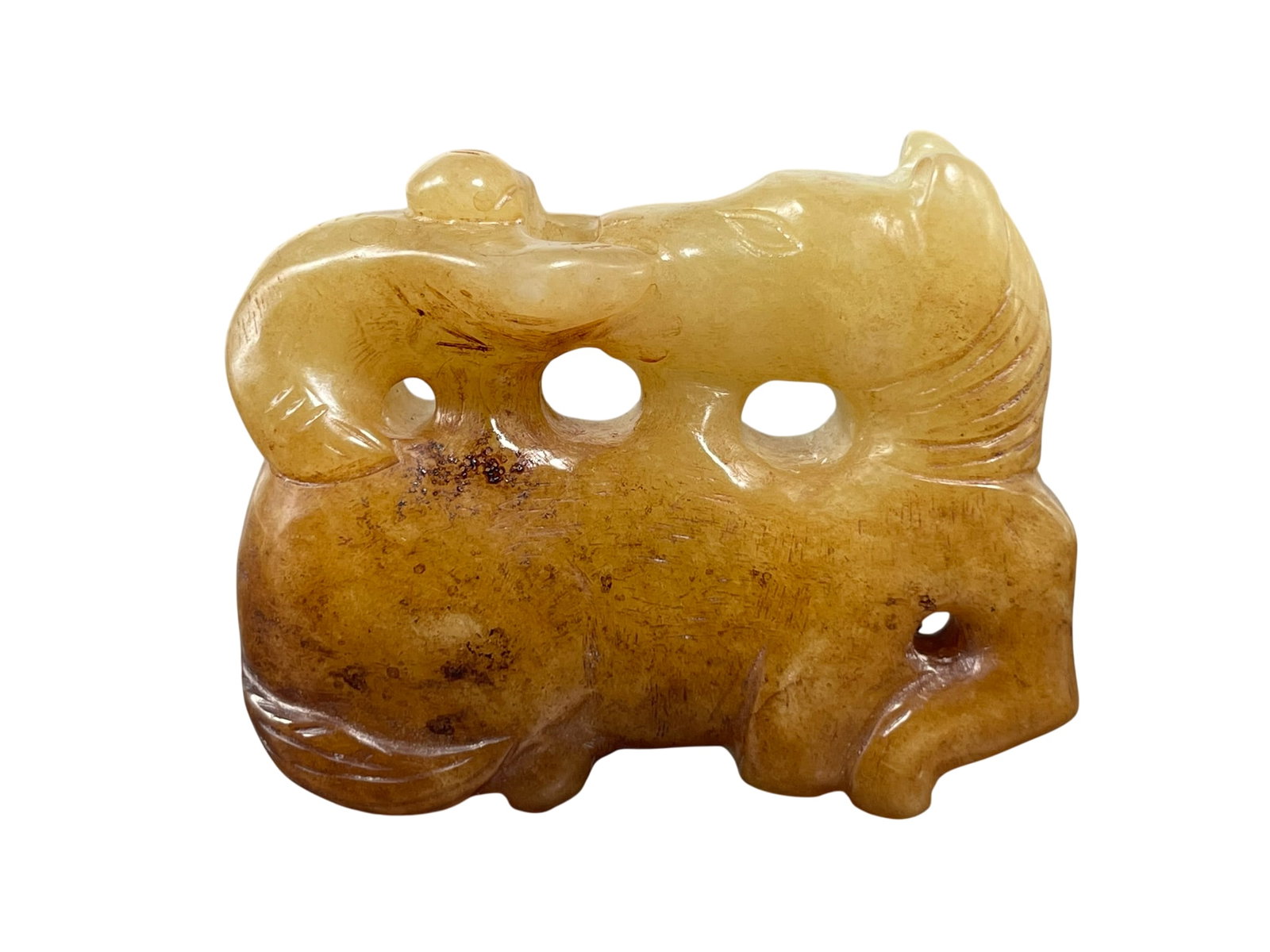 A Chinese Celadon and Russet Jade Carving of Monkey and Horse: 1.3/4 in. high, 2.1/4 in. wide.