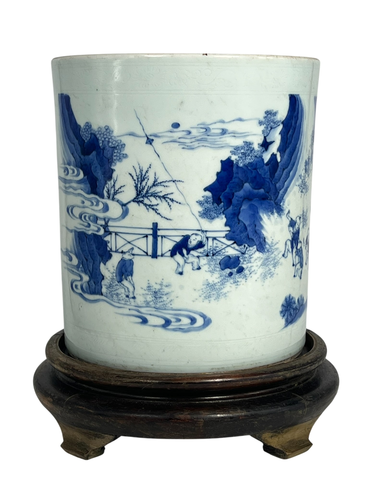 A Chinese Blue and White 'Lady and Boys' Porcelain Brush Pot, Qing Dynasty: 9.1/8 in. high, 8.1/8 in. diam.