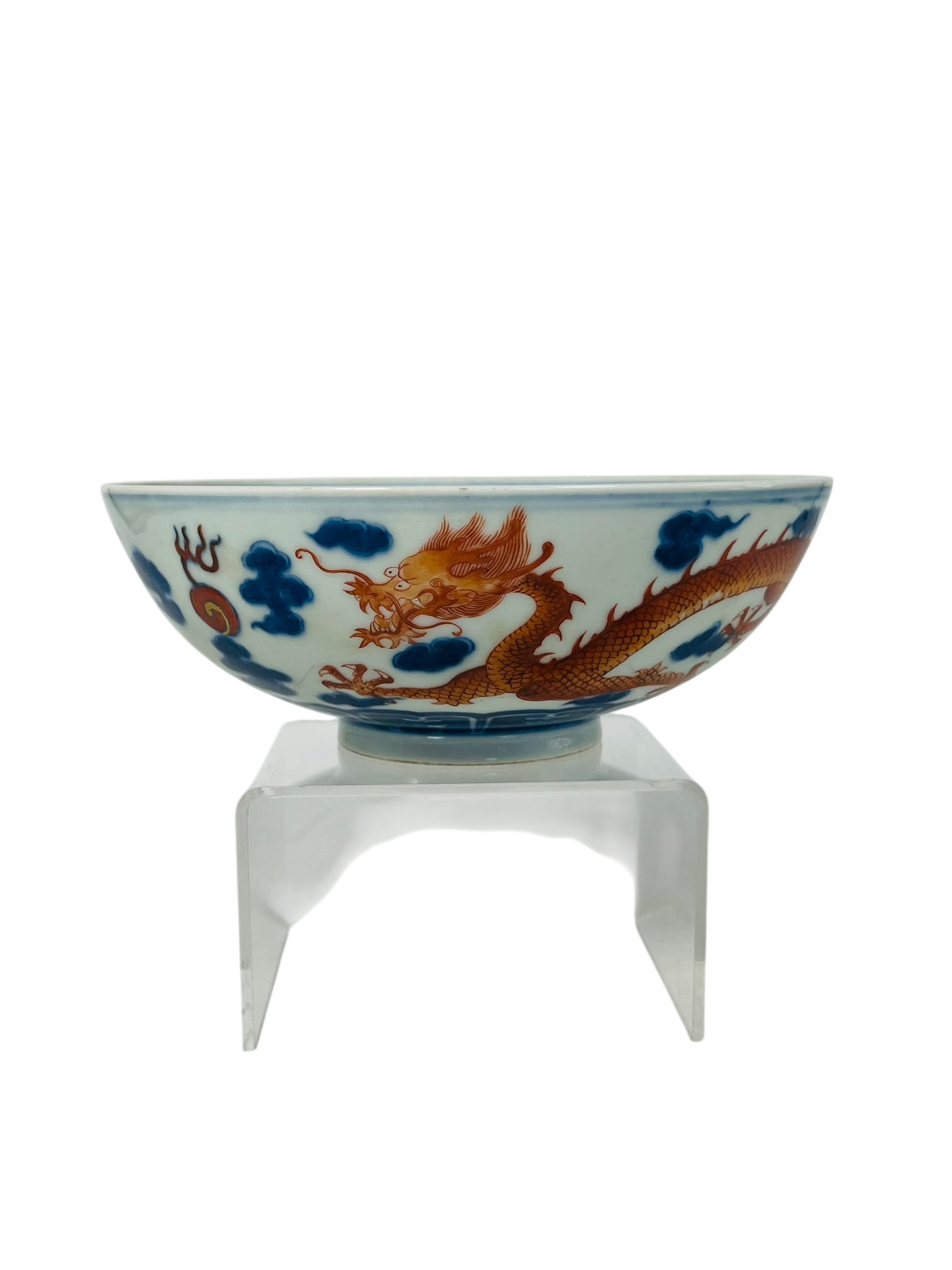 A Chinese Underglaze-Blue and Iron-Red Decorated 'Dragon' Bowl, Jiaqing Period, Qing Dynasty: 7 in. high, 2.1/2 in. wide.