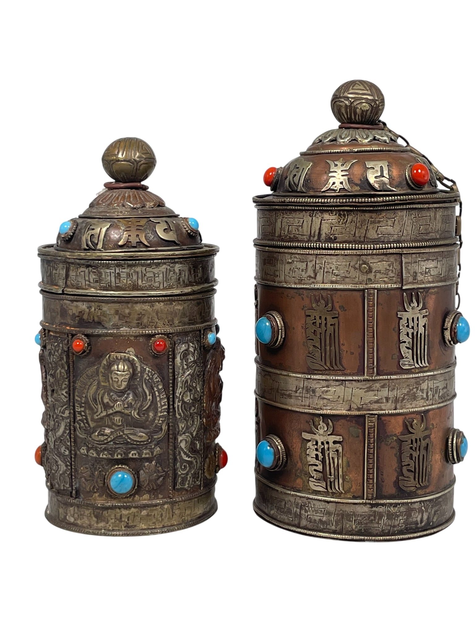 Two Tibetan-Style Metal and Copper Cylindrical Container: Probably as prayer wheel holders. The taller one measures 8 in. high, 3.1/2 in. wide; the shorter one measures 7 in. high, 3.1/2 in. wide.