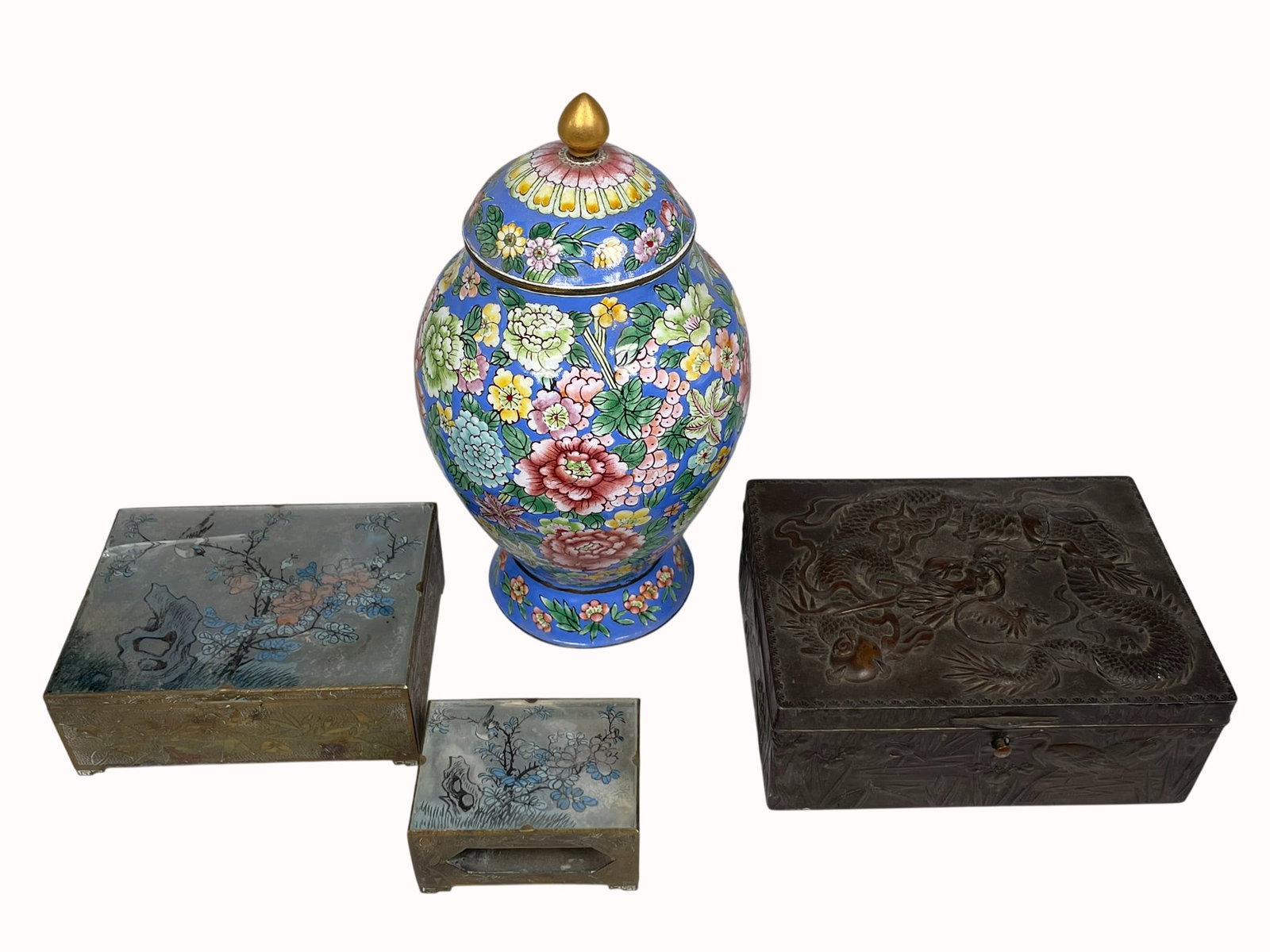 A Group of Four Chinese Decorative Objects: Comprising a painted enamel jar and cover, 7 in. high, 4 in. wide; a metal 'dragon' jewelry box, 2 in. high, 5 in. wide, 3.5/8 in. deep; a metal and inside-paint glass trinket box, 1.1/2 in. high, 4 i