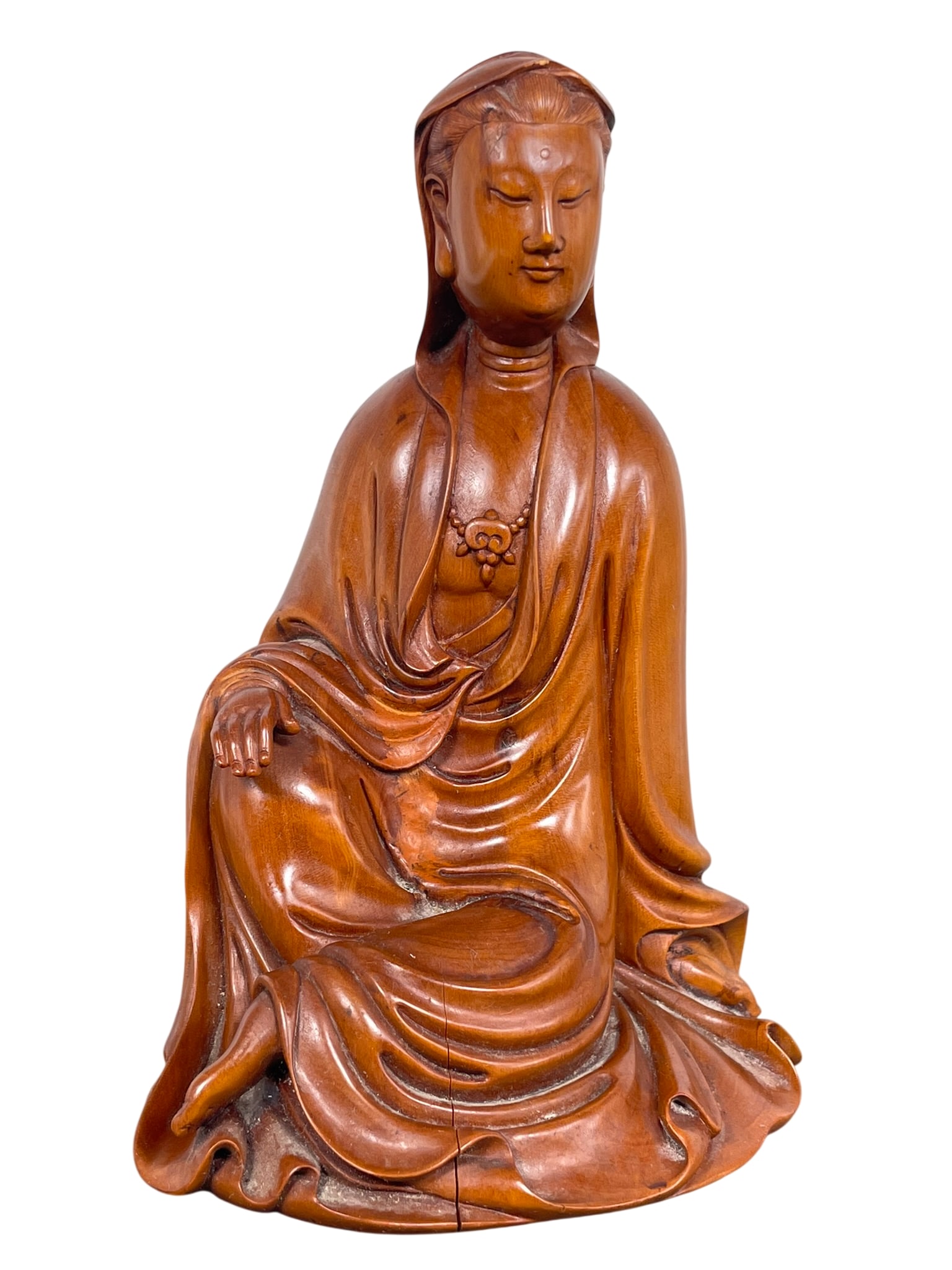 A Chinese Boxwood Figure of Guanyin: 7 in. high, 4.5/8 in. wide.