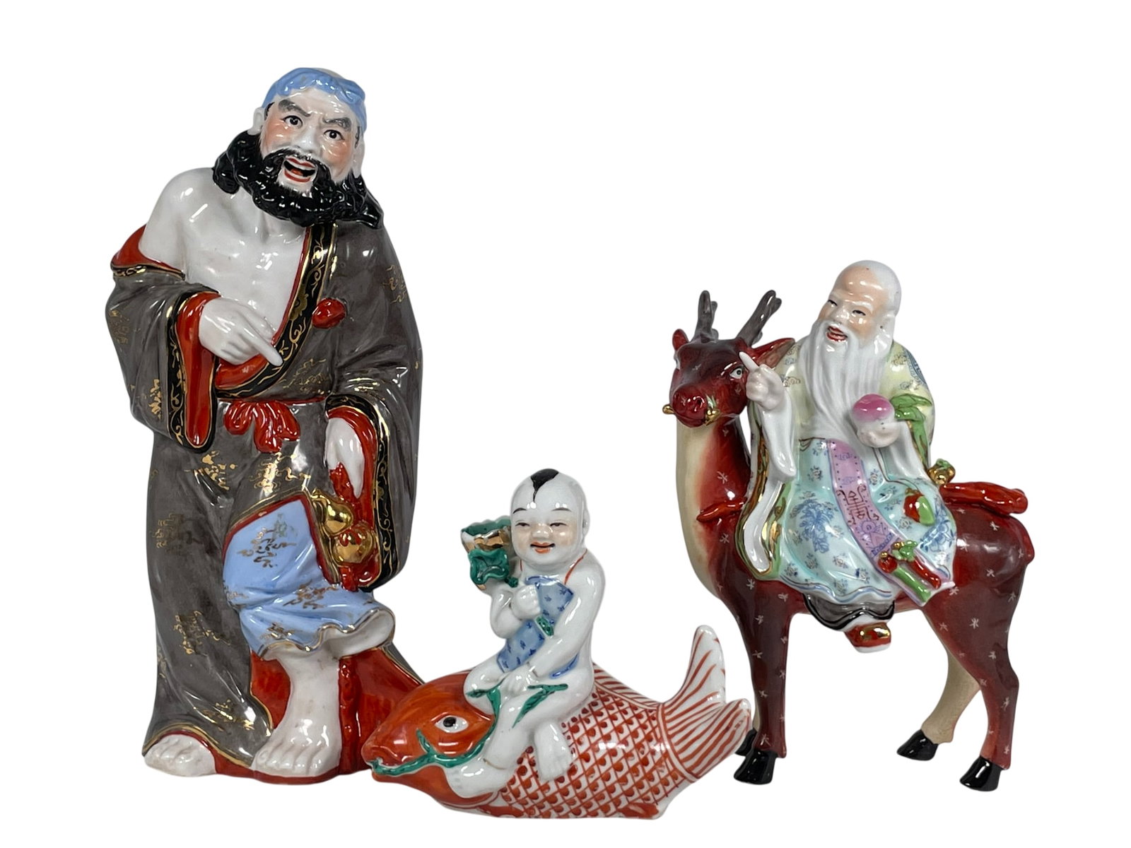 A Group of Three Chinese Famille Rose Porcelain Figures: 13 in. high, 5.1/2 in. wide for the largest figure.