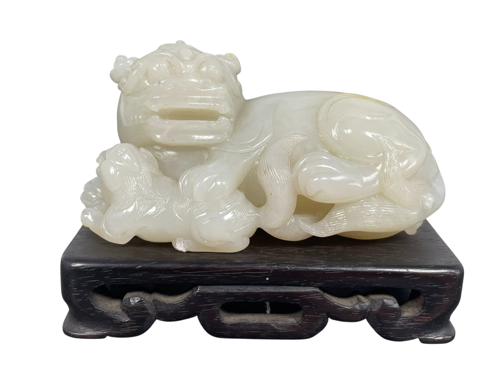 A Chinese White and Russet Jade Carving of Buddhist Lion and Cub (1 of 9)