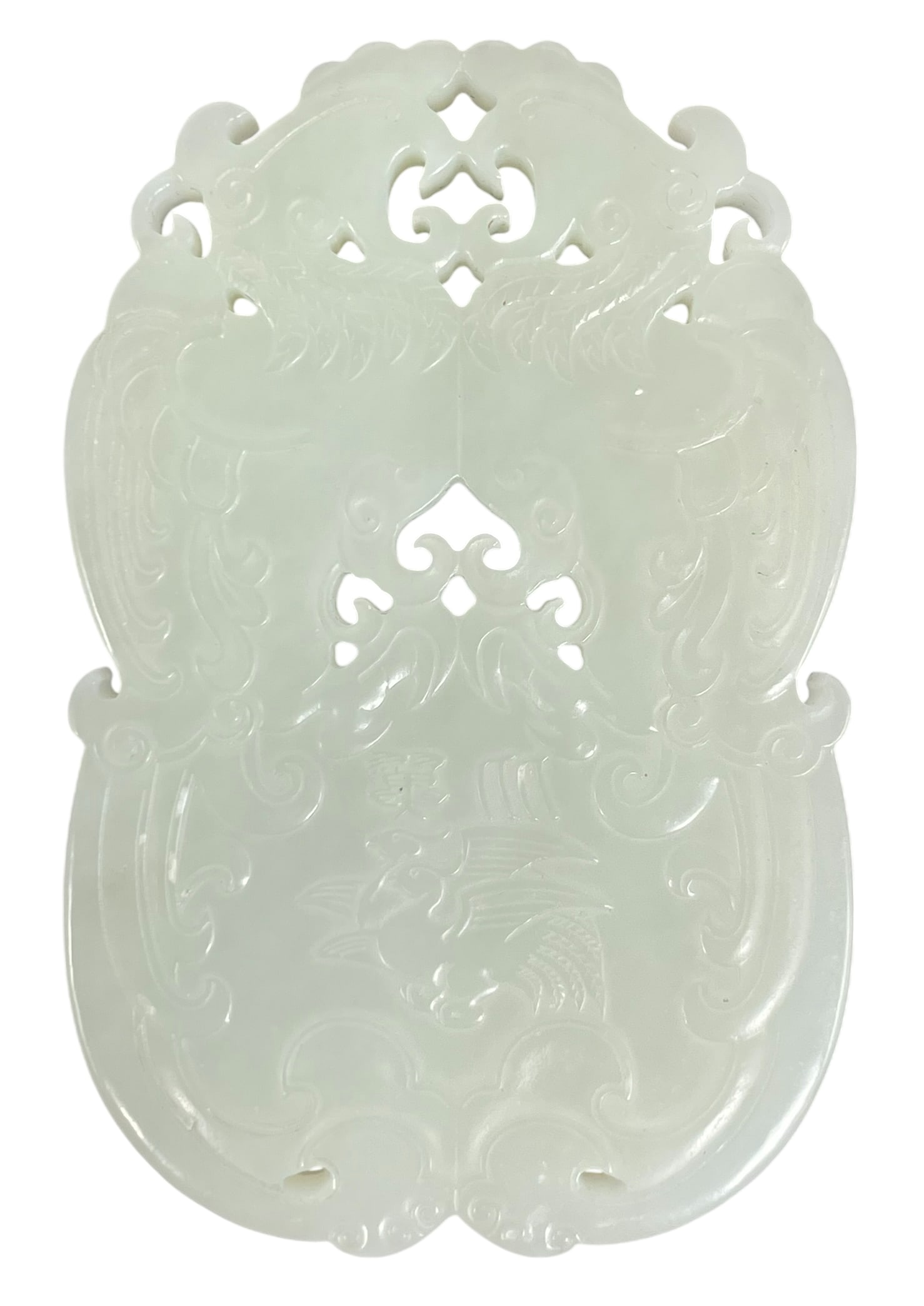 A Chinese Carved and Reticulated White Jade 'Mandarin Duck' Plaque: 3.1/2 in. long, 2.1/4 in. wide.