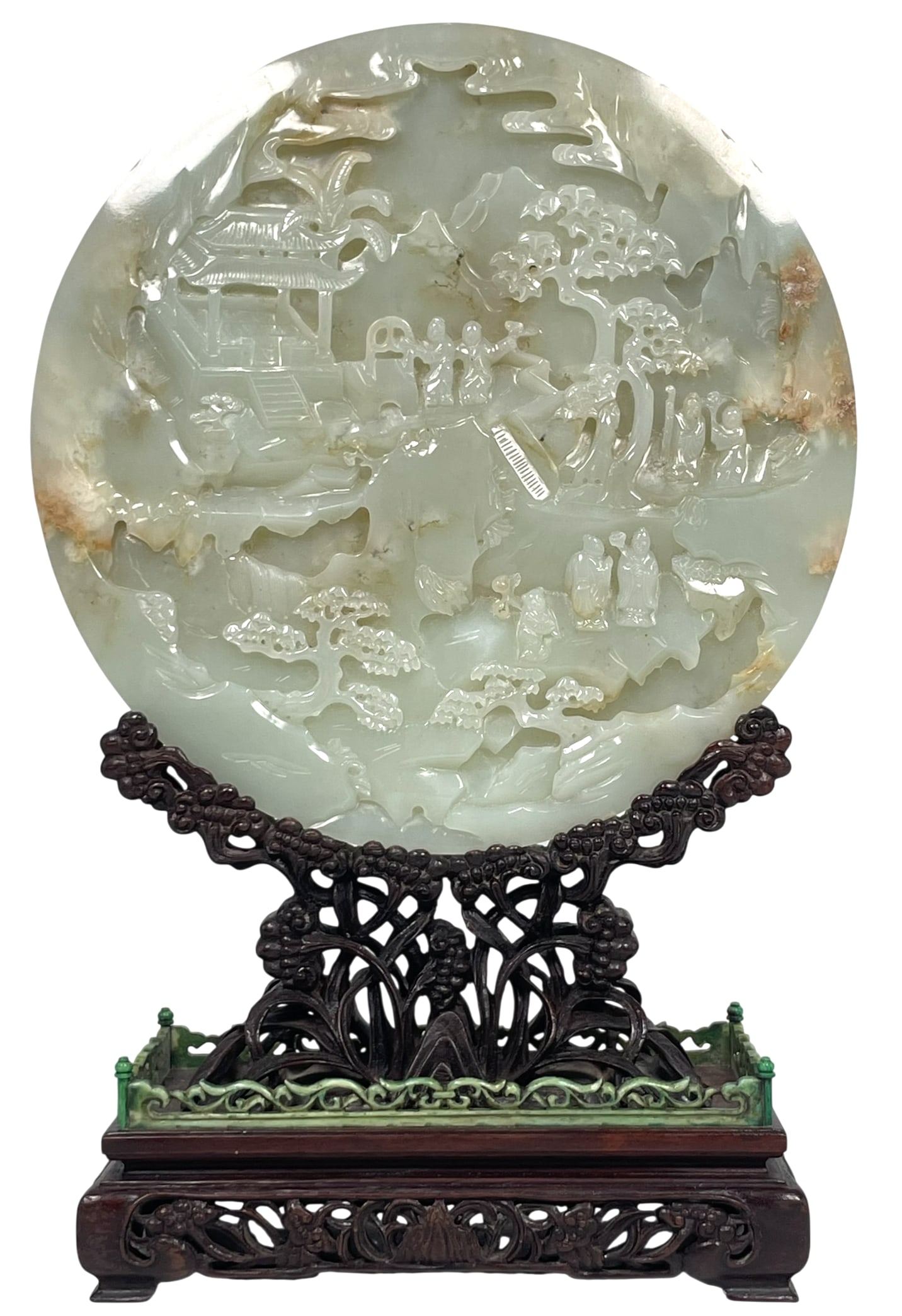 A Chinese Carved White and Russet Jade Table Screen: With a reticulated wood stand. The circular jade plaque measures 8 in. diam.; 12 in. high, 8 in. wide overall including the stand.