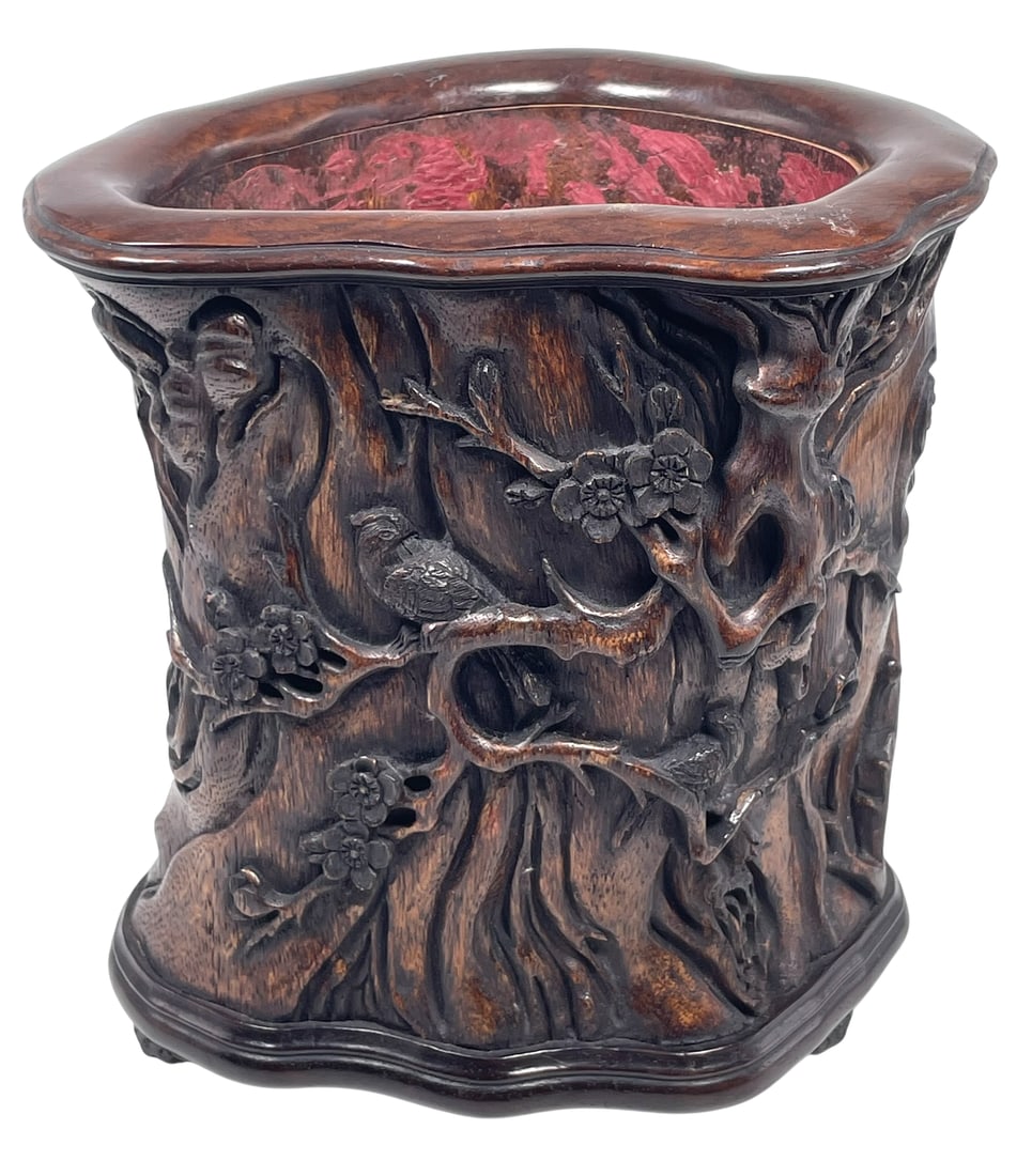 A Chinese Carved Aloeswood Brush Pot: 8.1/8 in. high, 7.7/8 in. wide.