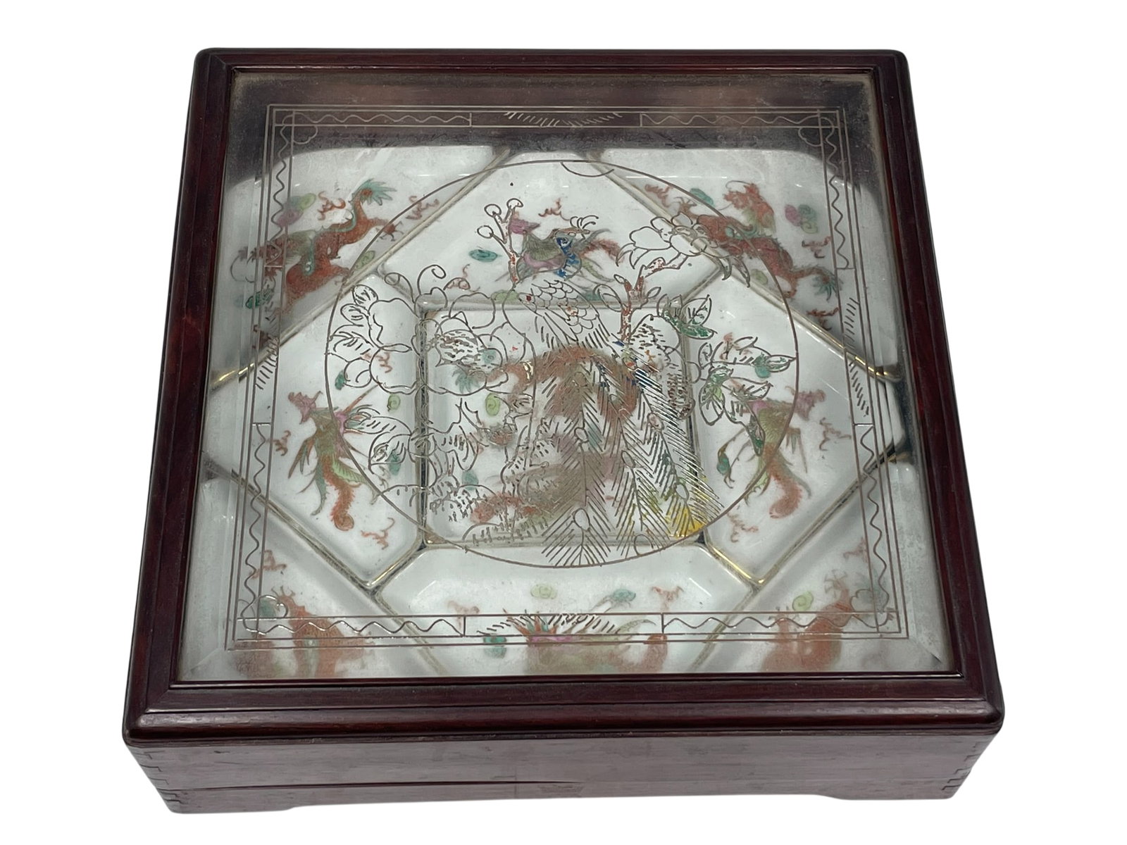 A Chinese Nine-Section Porcelain Sweetmeat Dish Set: With a fitted wood box. 3.1/2 in. high, 11 in. square for the wood box.