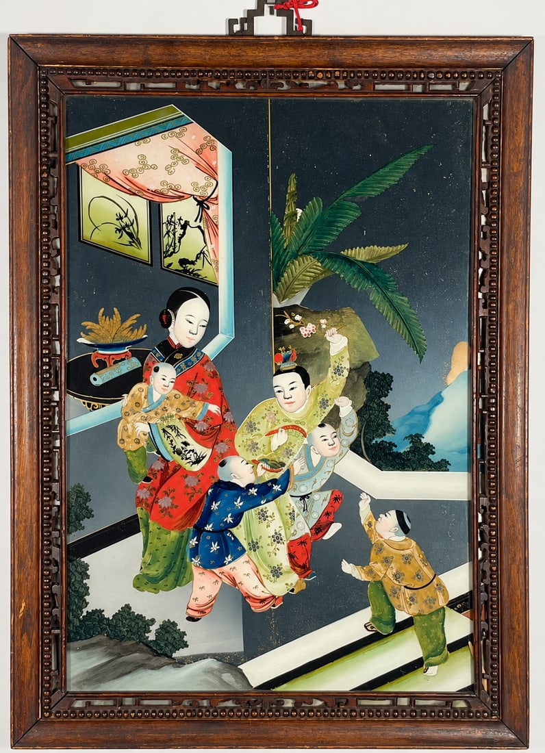 A Chinese Reverse Painting on Glass: 22.1/2 in. x 16.1/4 in. overall including the frame.