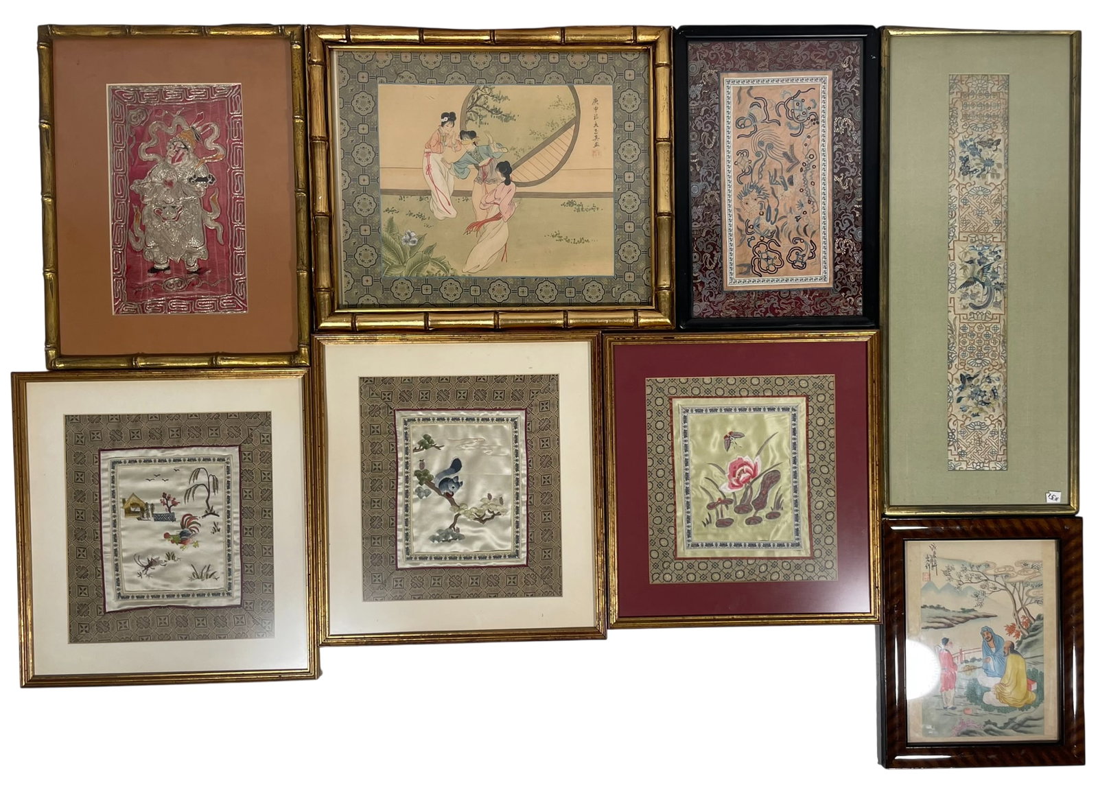A Group of Eight Decorative Objects: Comprising two paintings and six embroidered silk panels, with the longest measures 24.1/2 in. x 10.1/4 in. overall including the frame.