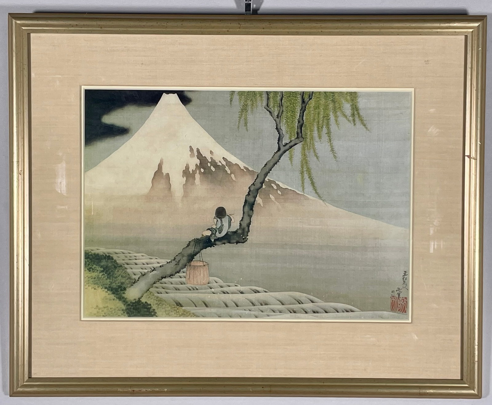 A Japanese Print 'Boy Viewing Mount Fuji', Reproduction of Work by Katsushika Hokusai: 19.1/2 in. x 16 in. overall including the frame.