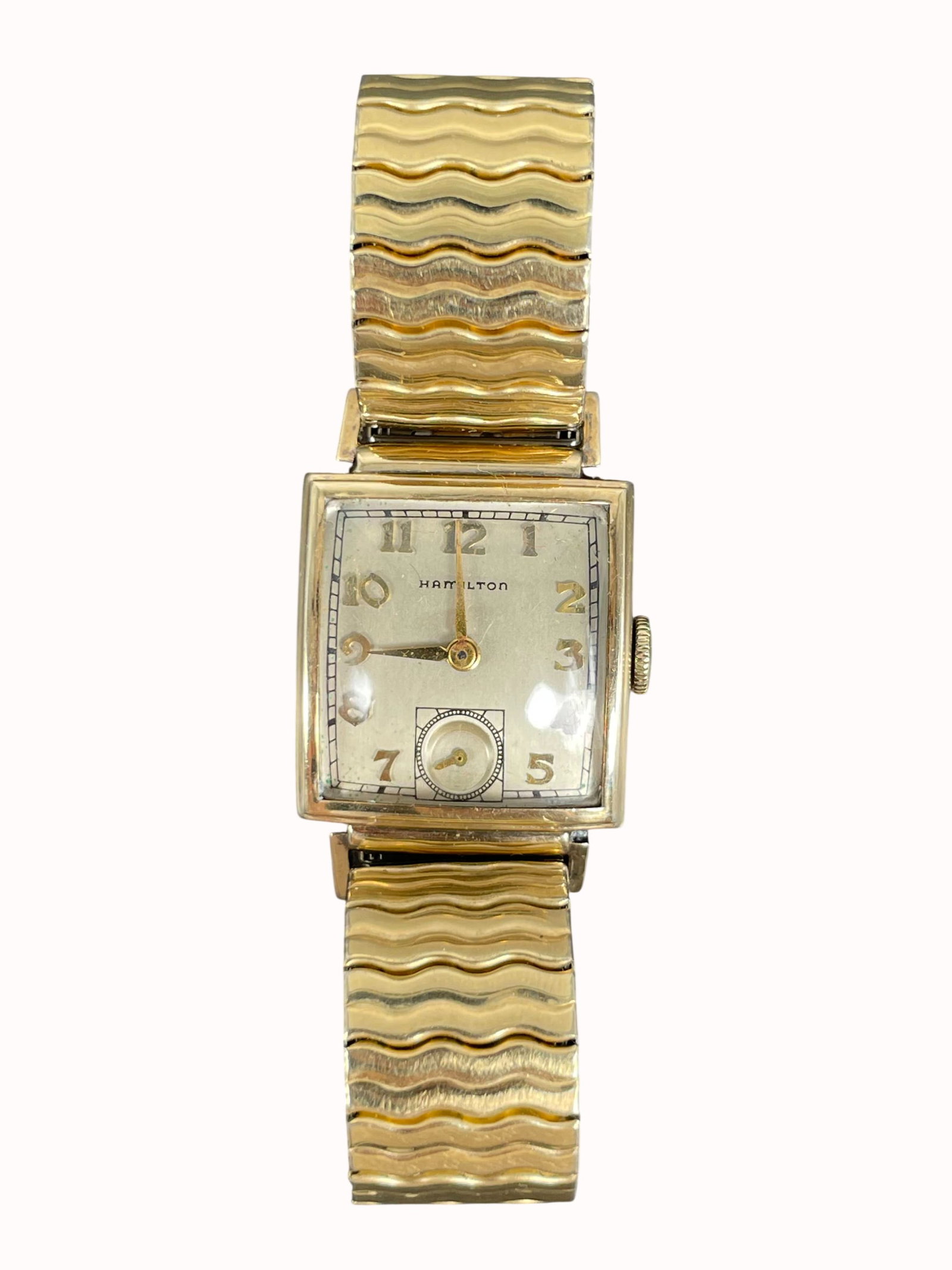 A Vintage Men's Hamilton 14K Gold Filled Wristwatch: The dial measures 1 in. x 7/8 in.