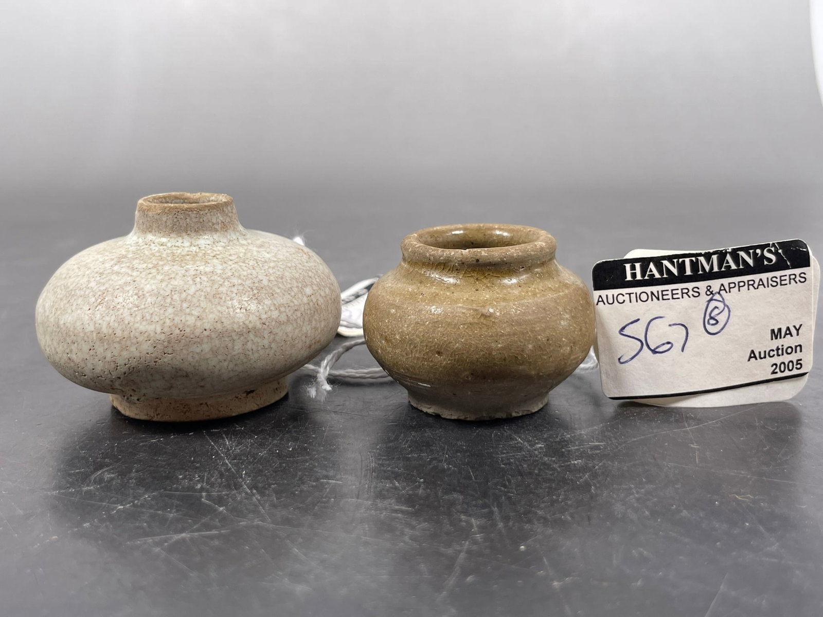 Two Swklk Miniature Jars: The larger one measures 1.1/2 in. high, 2 in. wide. A Private Collection of a Retiring University Professor.