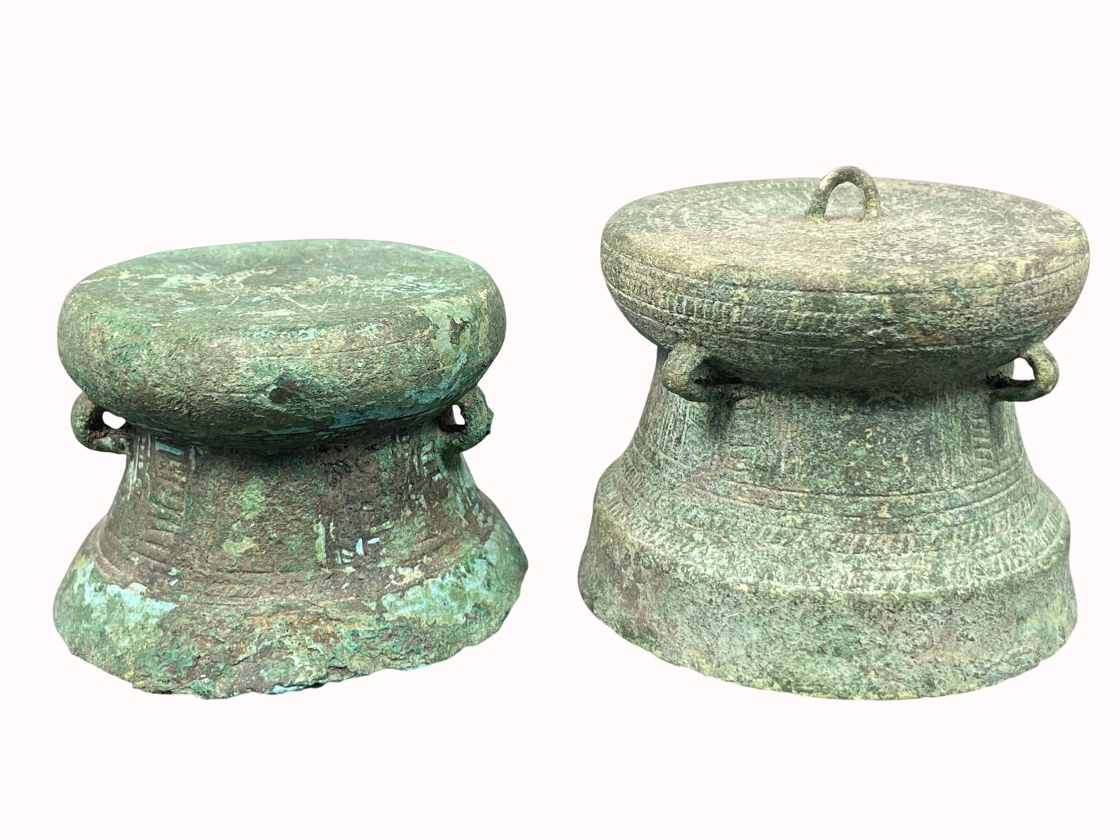 Two Vietnamese Small Bronze Drums: The larger one measures 2.1/2 in. high, 3 in. diam. A Private Collection of a Retiring University Professor.
