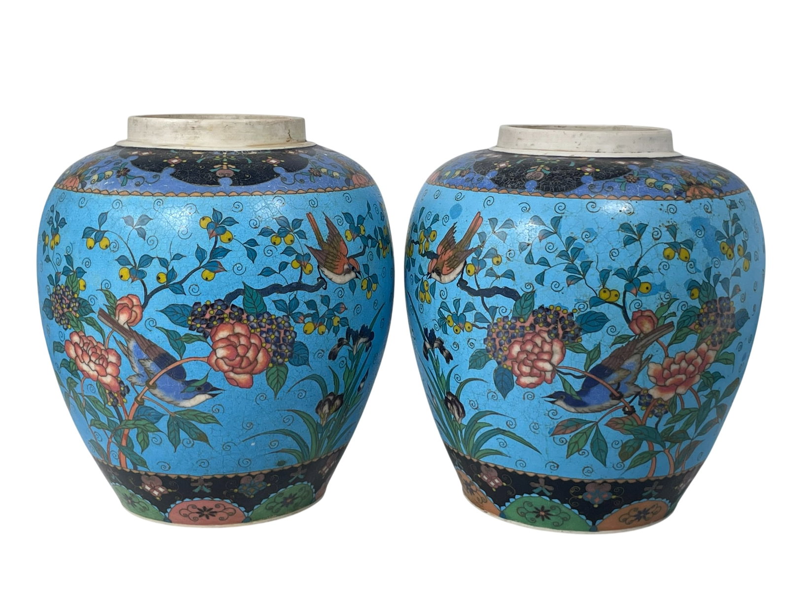 A Pair of Japanese Cloisonne Porcelain Jars: 10.5/8 in. high, 9.1/2 in. wide each.