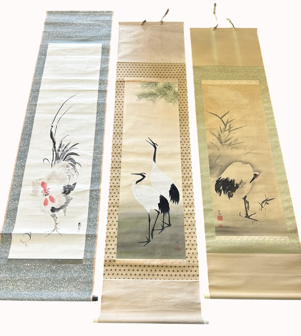 A Group of Three Japanese Paintings of Birds: Comprising a painting of rooster, a signature of the artist and a seal, 78 in. x 20.1/2 in. overall; a painting of cranes, a signature of the artist and a seal, 77 in. x 19 in. overall; and a painting