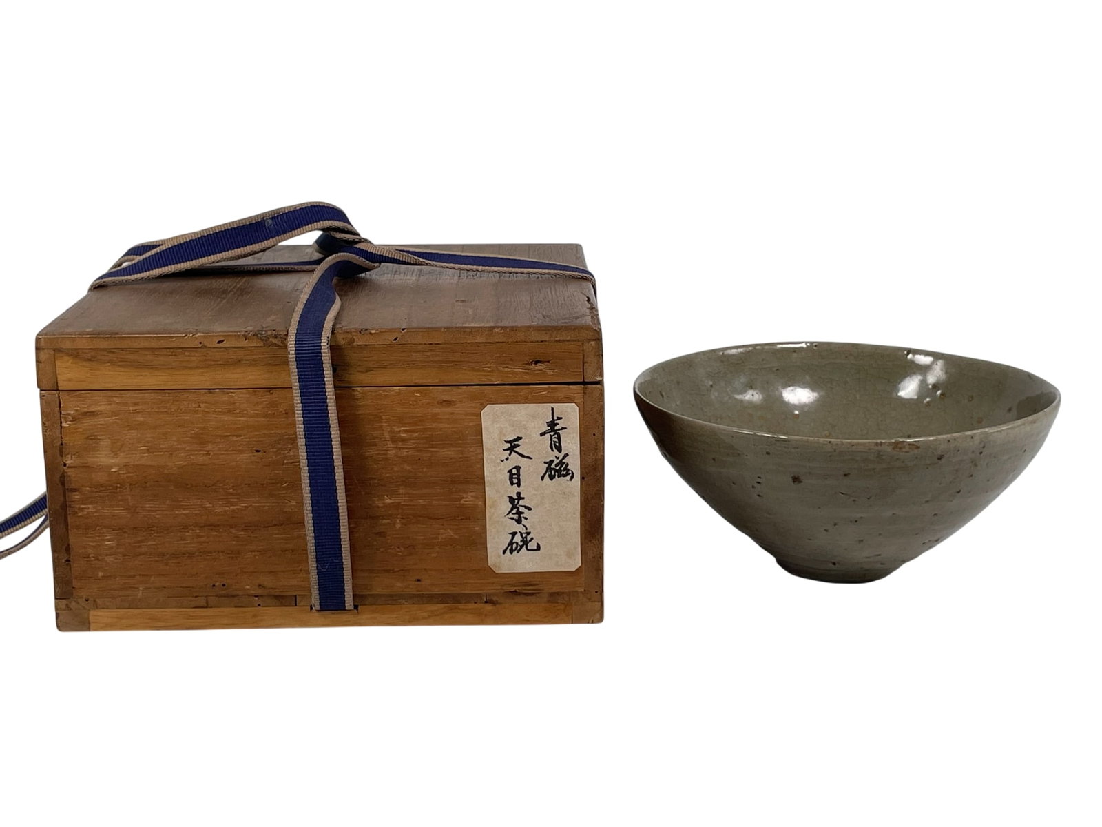 A Korean Celadon-Glazed Porcelain Bowl: 2.7/8 in. high, 6 in. diam. Japanese wood box.